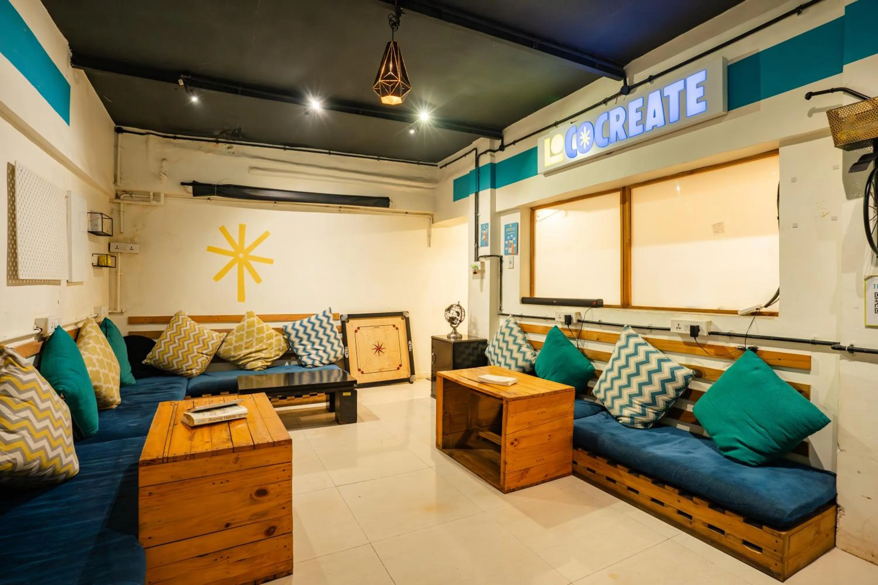 Living room in Locomo Hostel OG - Stay Work Eat