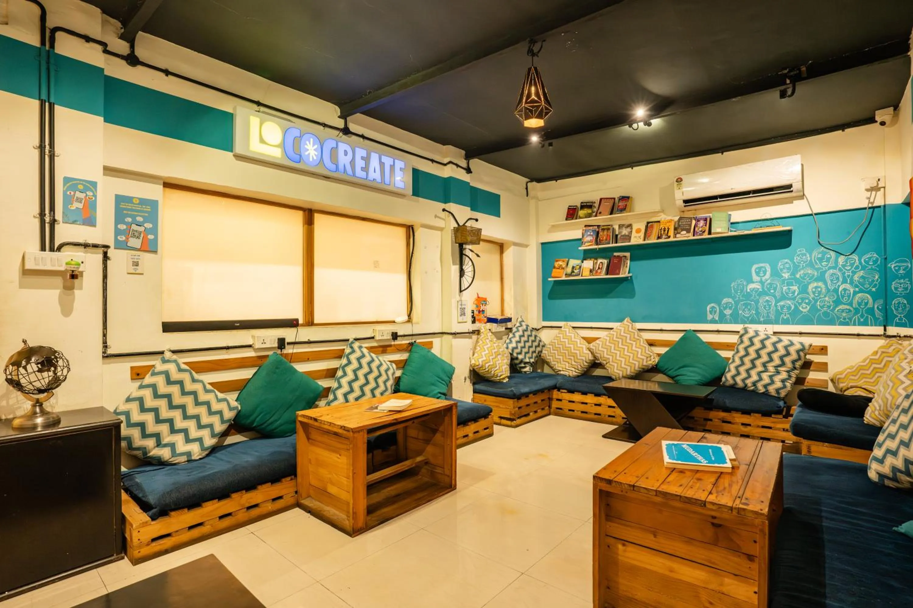 Living room in Locomo Hostel OG - Stay Work Eat