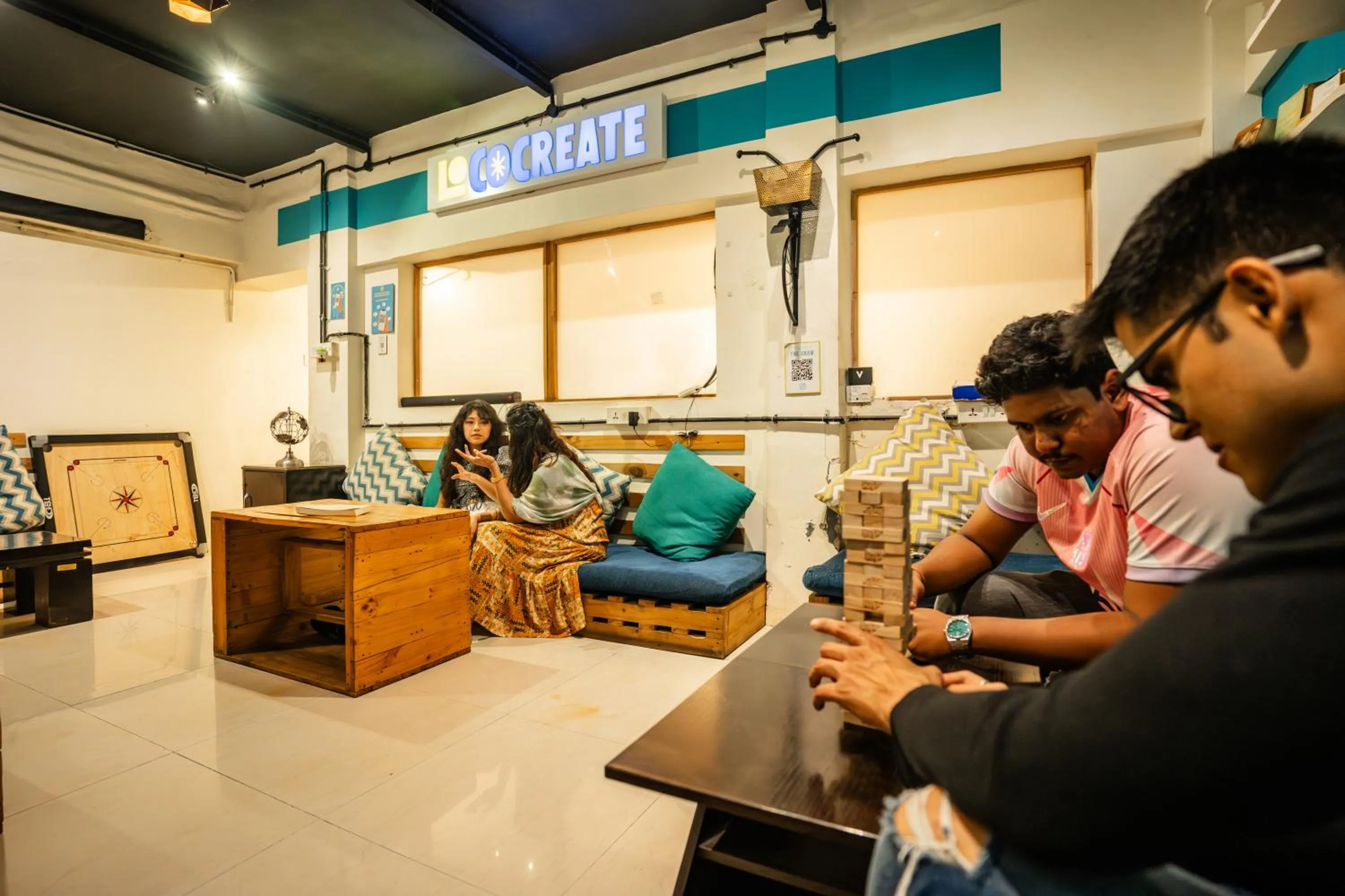 Seating area in Locomo Hostel OG - Stay Work Eat