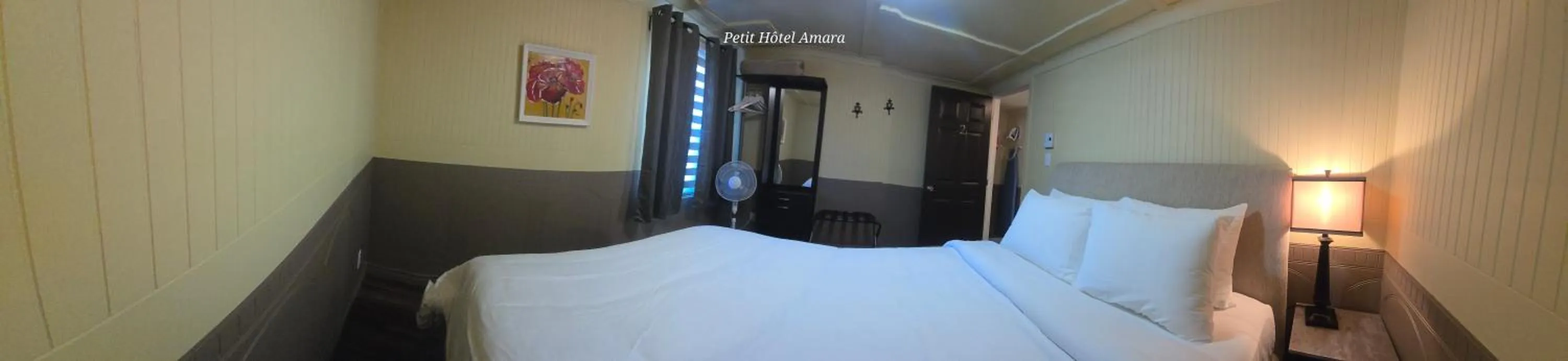 Bed in Petit Hôtel Amara