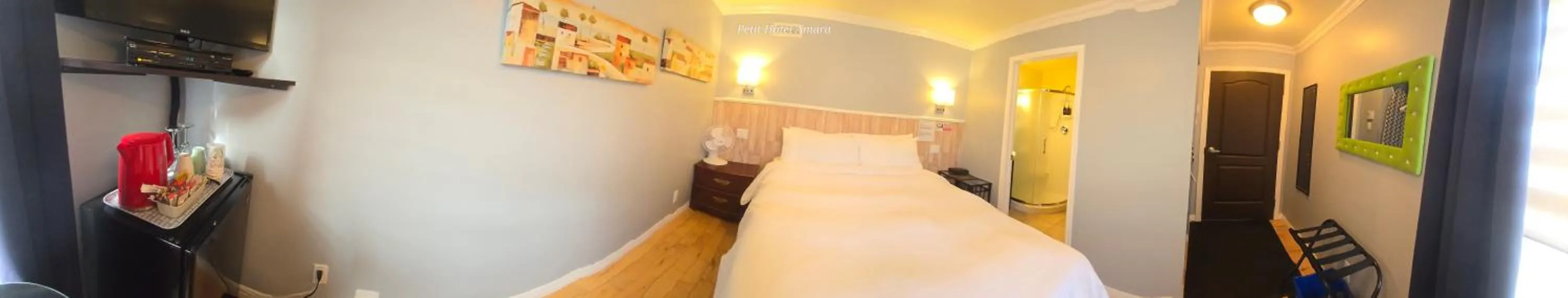 Bed in Petit Hôtel Amara