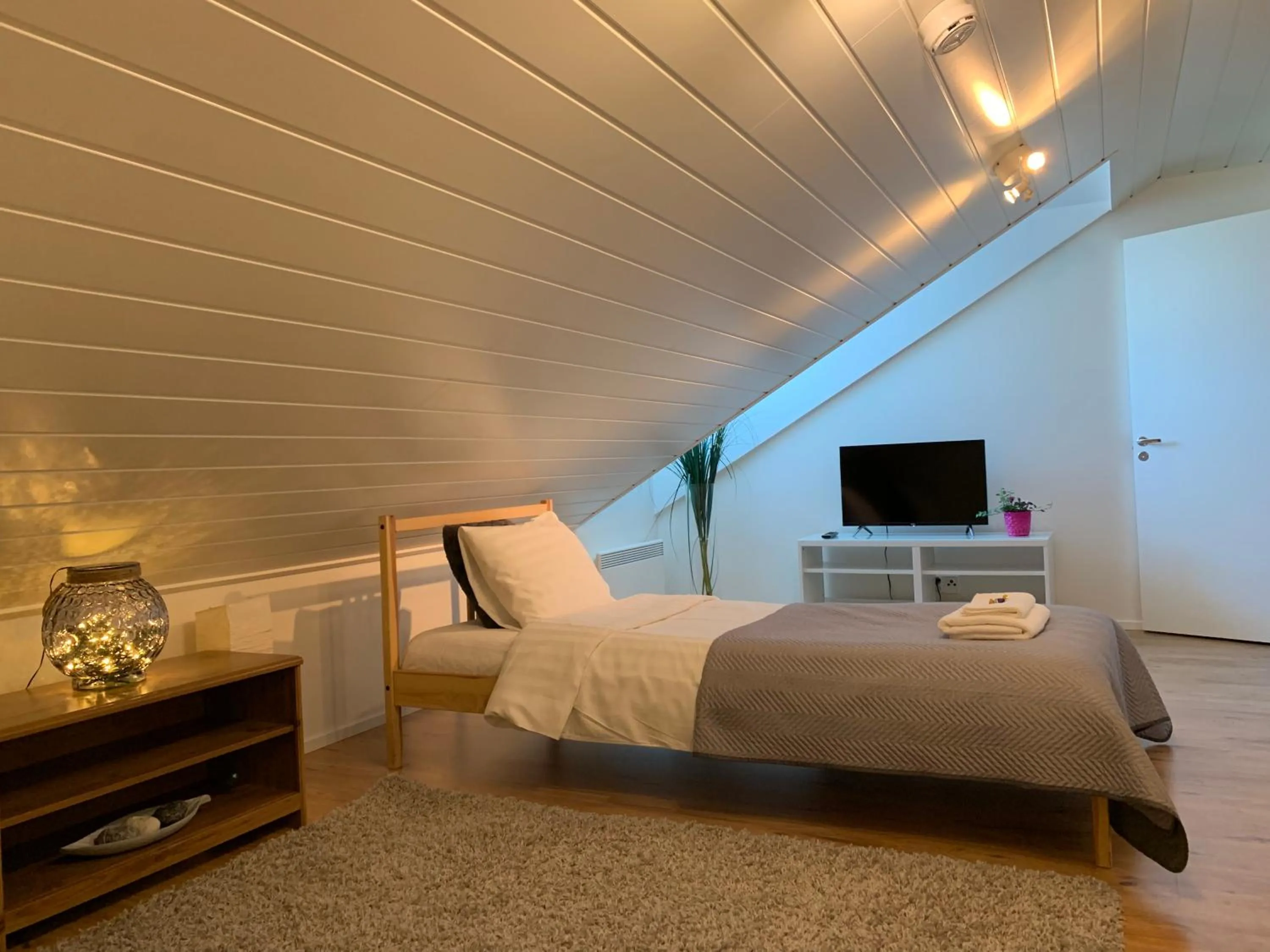 Bedroom, Bed in Apartments in Porvoo