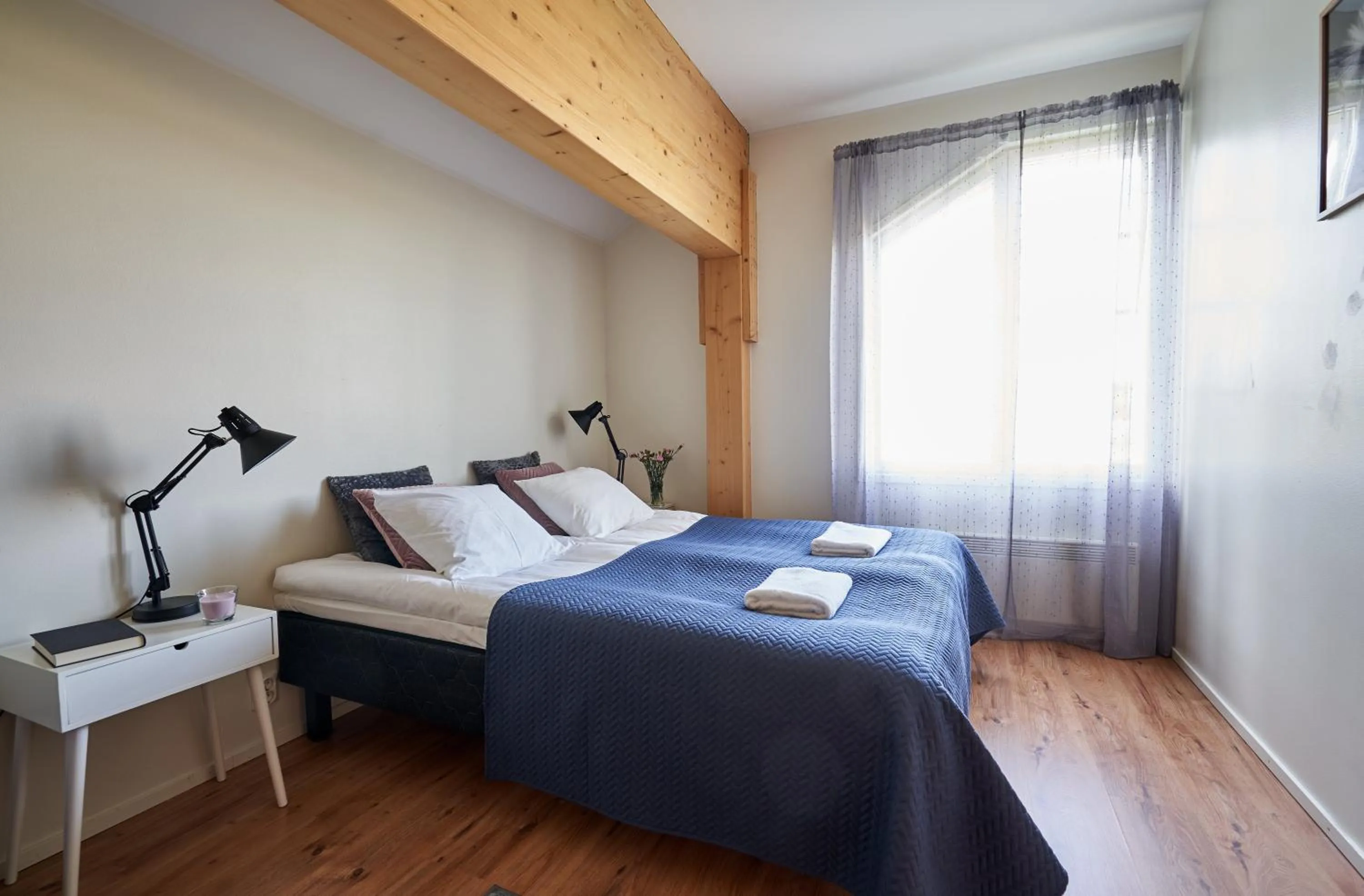 Bedroom, Bed in Apartments in Porvoo