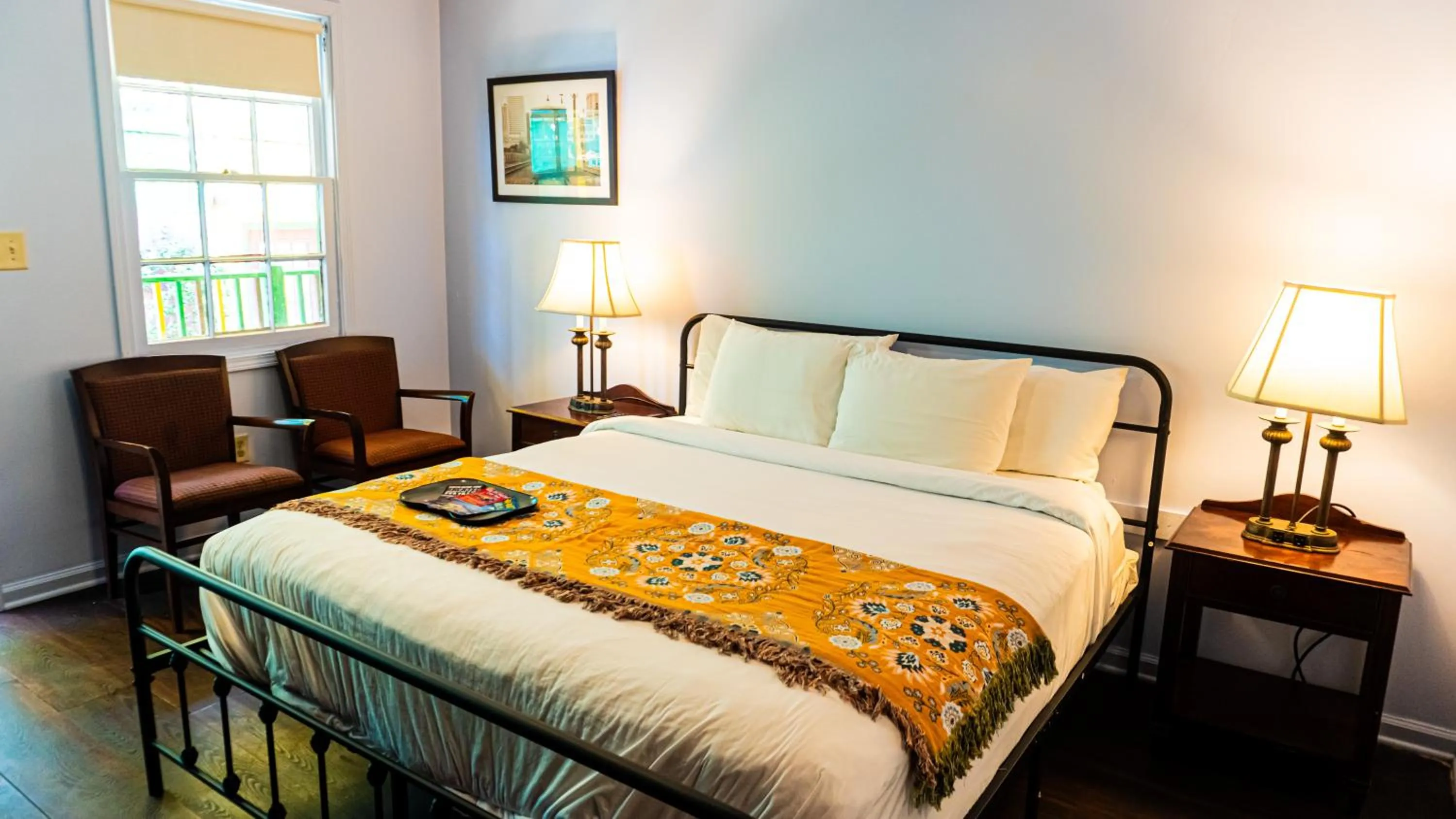 Bed in Historic Mardi Gras Inn