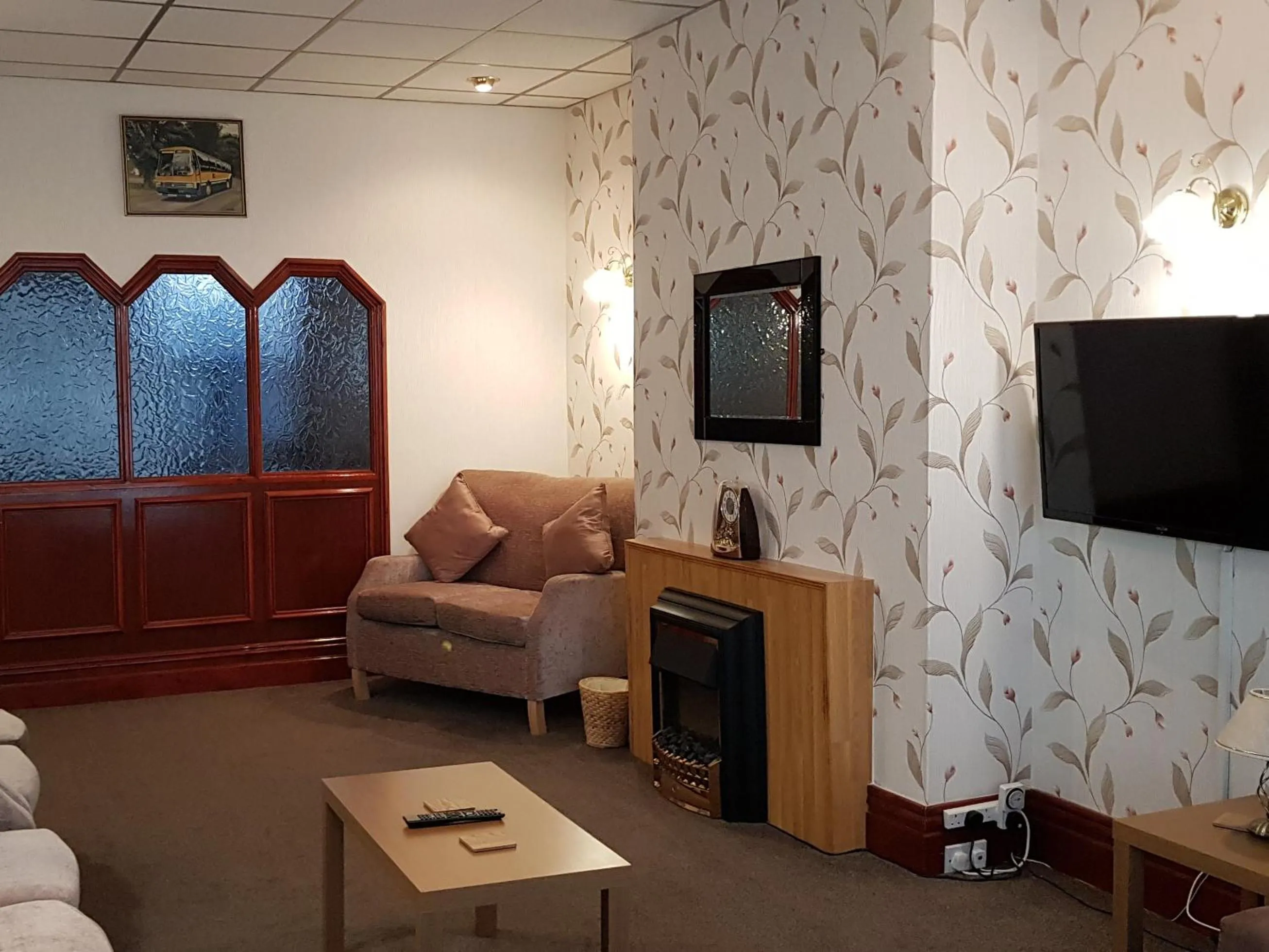 Living room in Lyndene Guest House