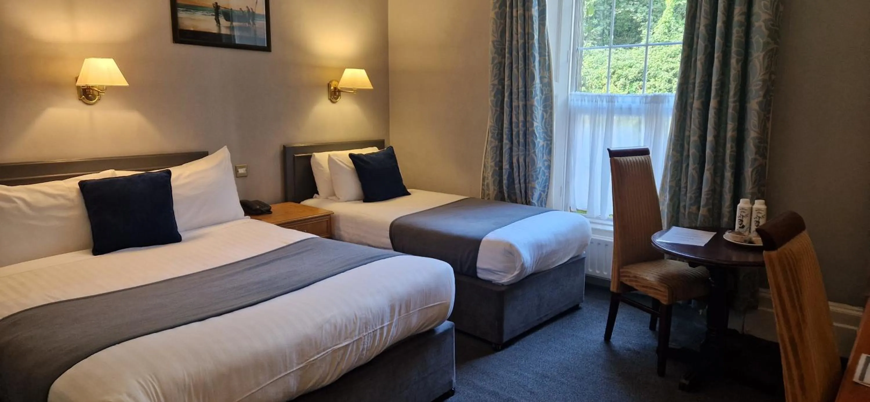 Bed in Commodore Hotel