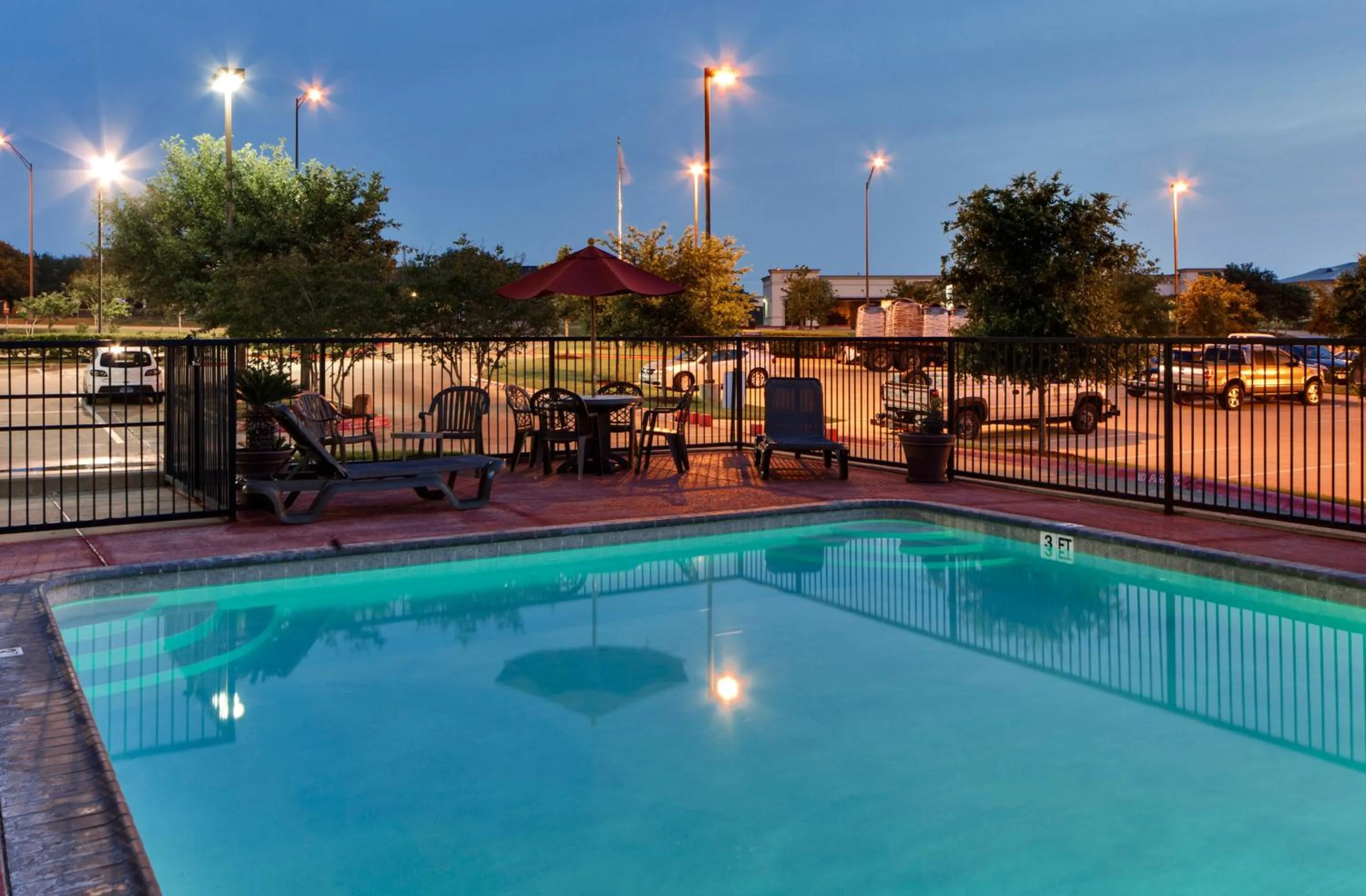 Swimming pool in Hawthorn Extended Stay by Wyndham College Station