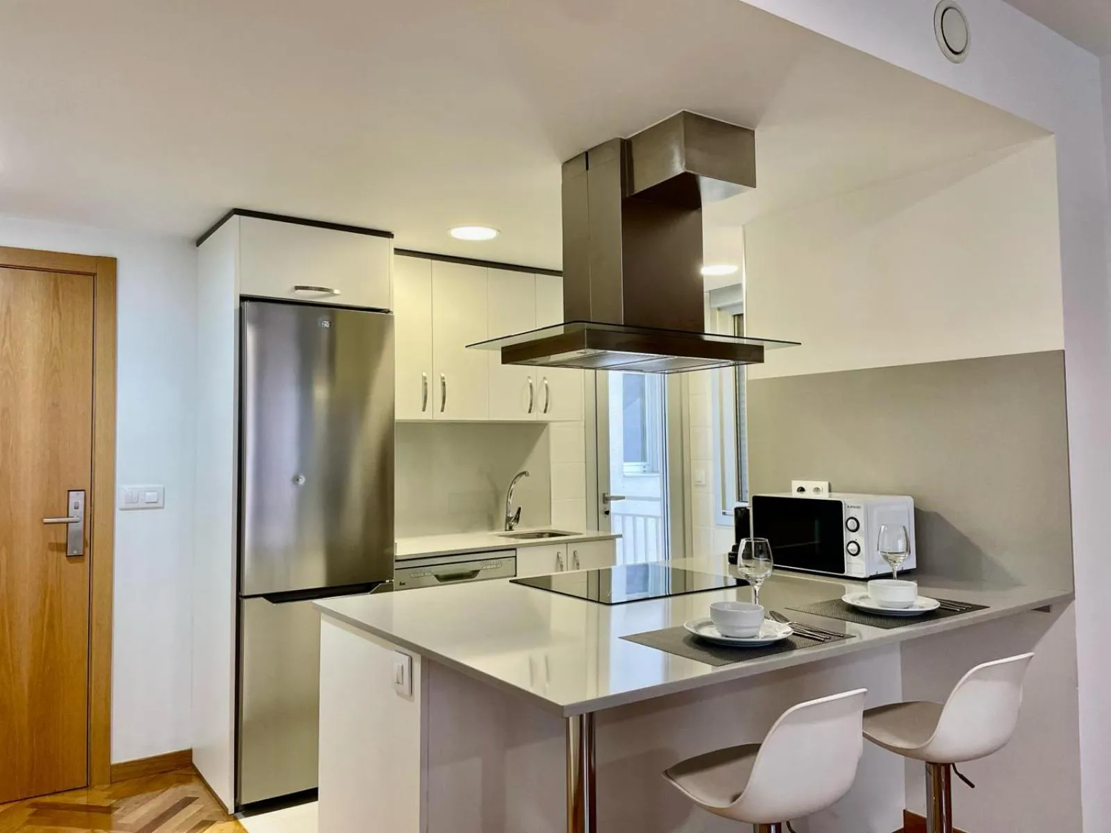 Kitchen or kitchenette in Cíes Premium Suitel García Barbón 73 - Love your Stay