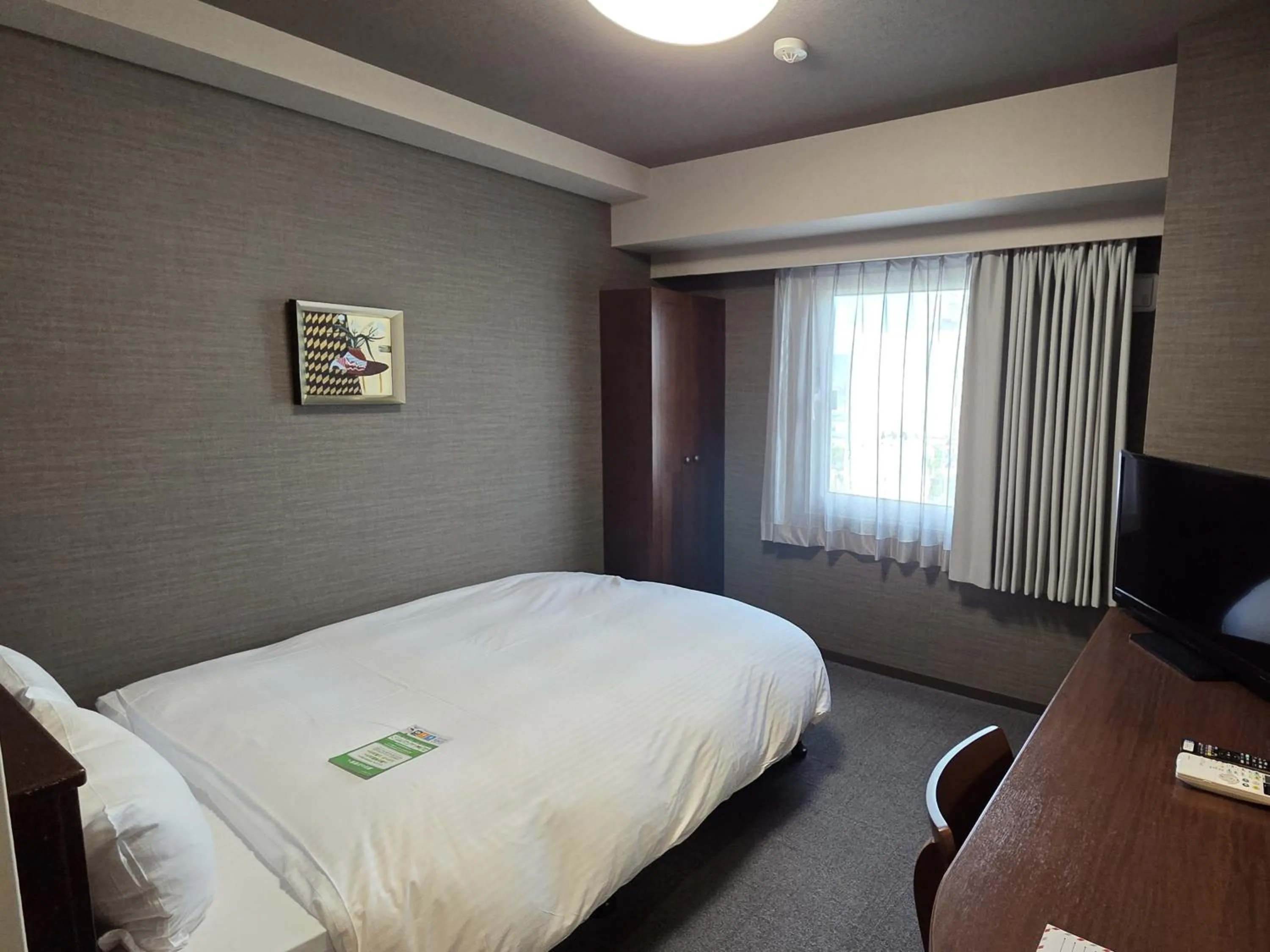 Photo of the whole room, Bed in Hotel Route-Inn Odate Eki Minami