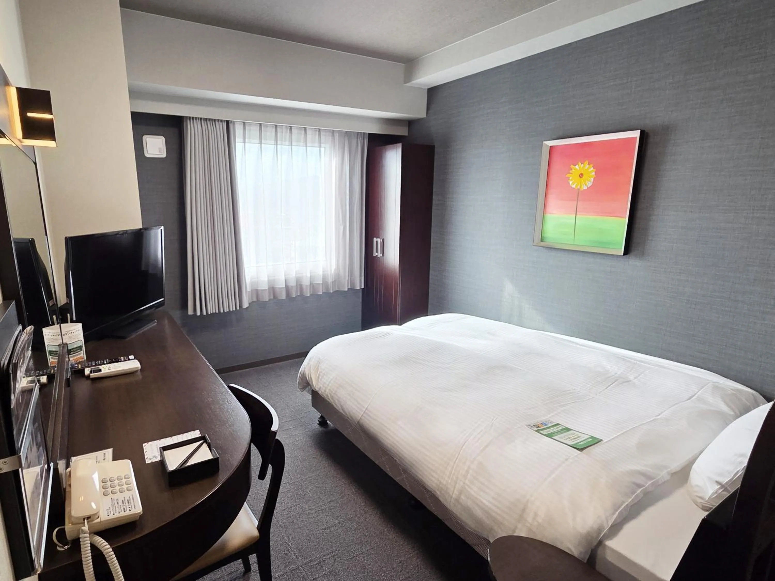 Photo of the whole room, Bed in Hotel Route-Inn Odate Eki Minami