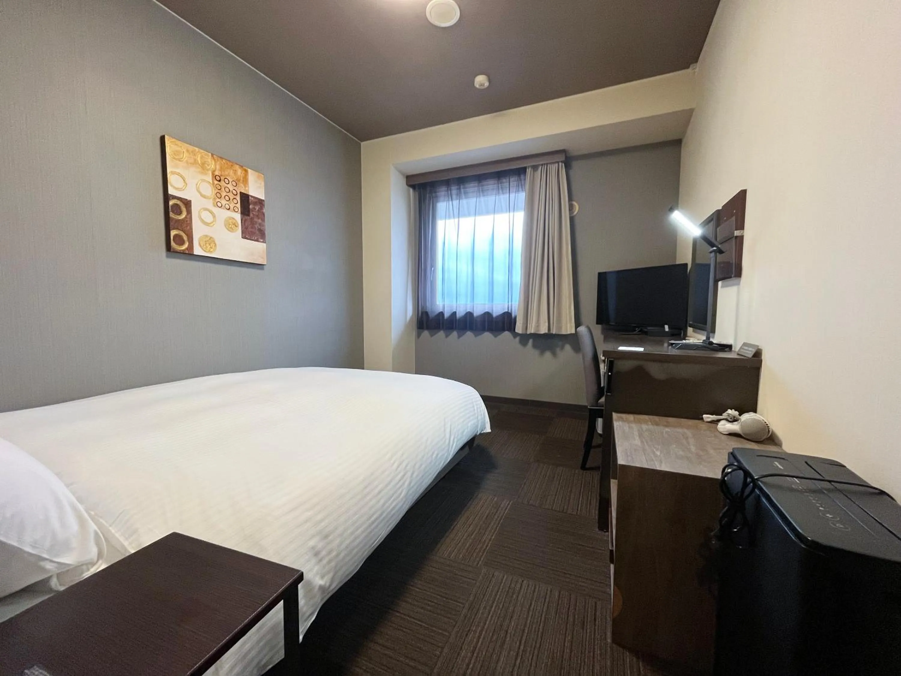 Photo of the whole room, Bed in Hotel Route-Inn Susono Inter