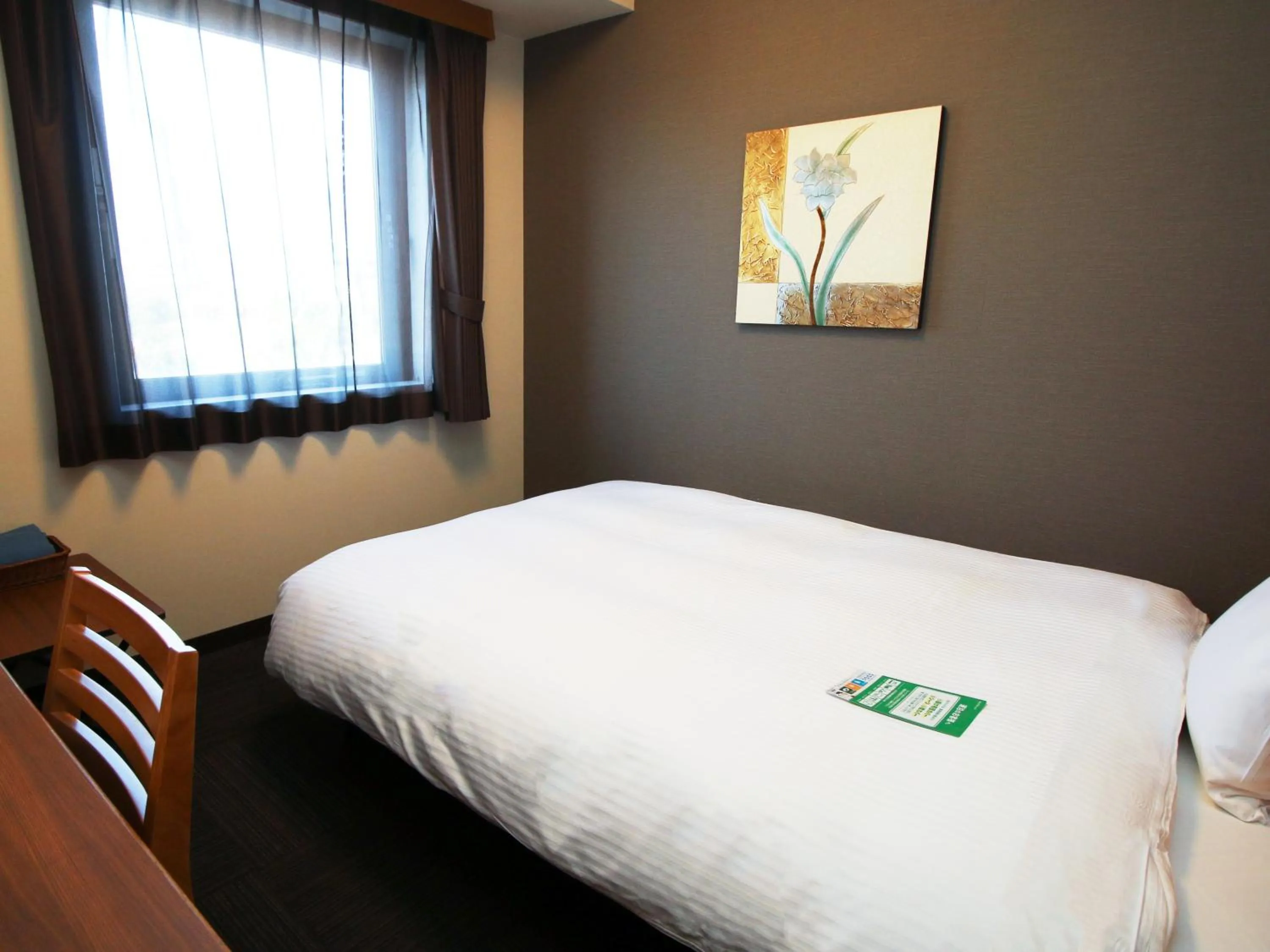 Photo of the whole room, Bed in Hotel Route-Inn Akita Tsuchizaki