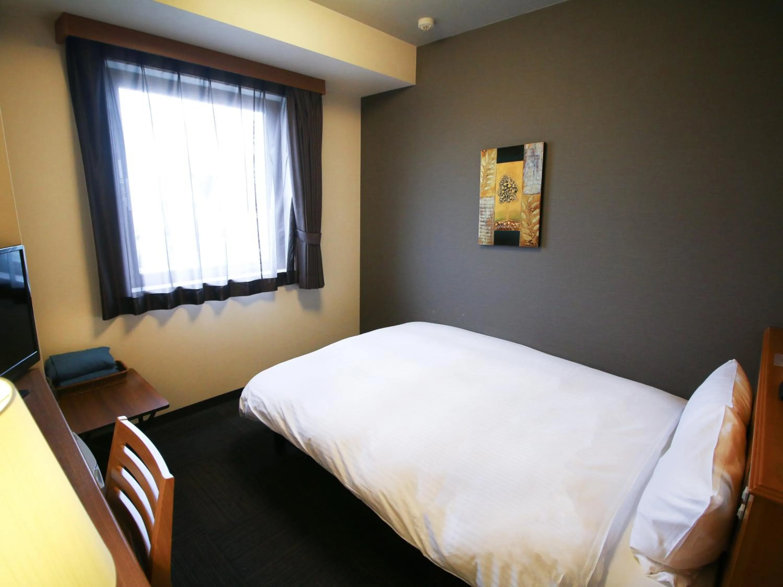 Photo of the whole room, Bed in Hotel Route-Inn Akita Tsuchizaki