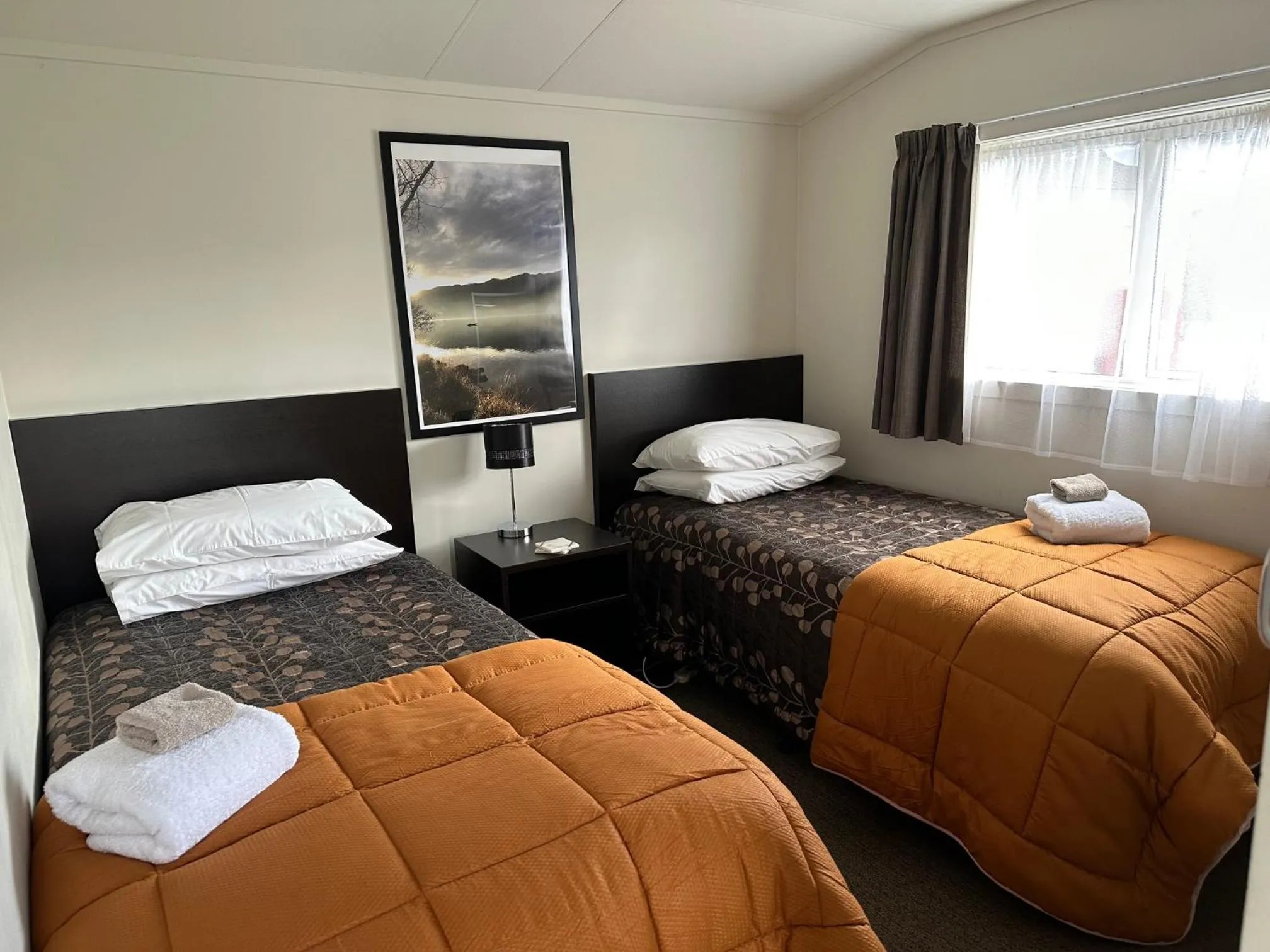 Bed in Anderson Park Motel