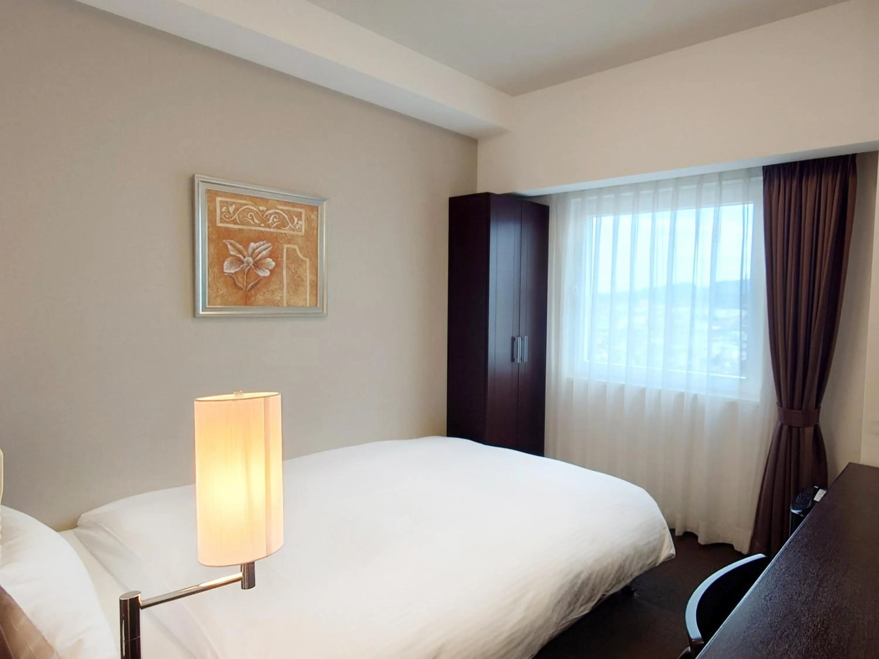 Photo of the whole room, Bed in Hotel Route-Inn Yurihonjo