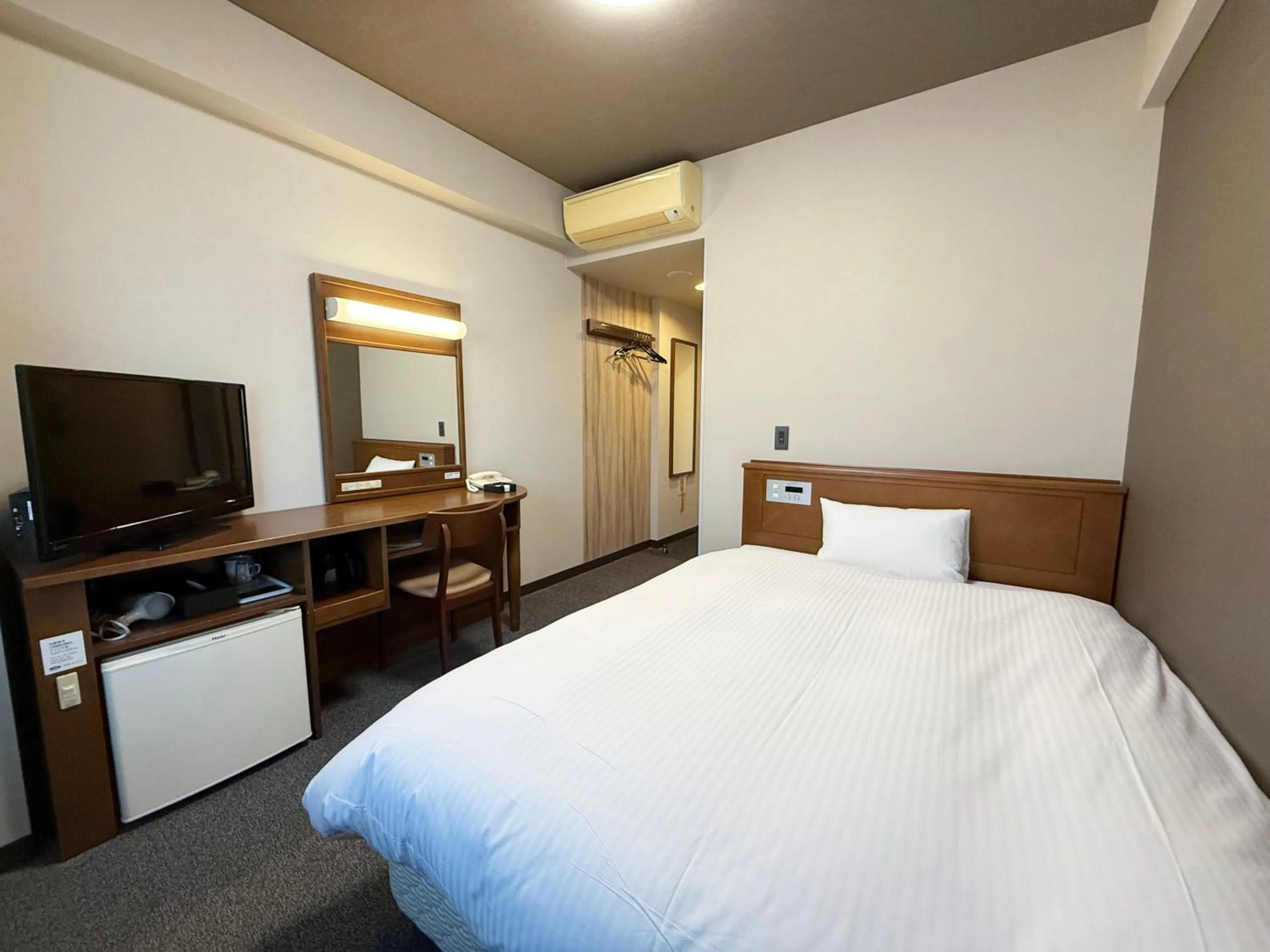 Photo of the whole room, Bed in Hotel Route-Inn Omagari Ekimae