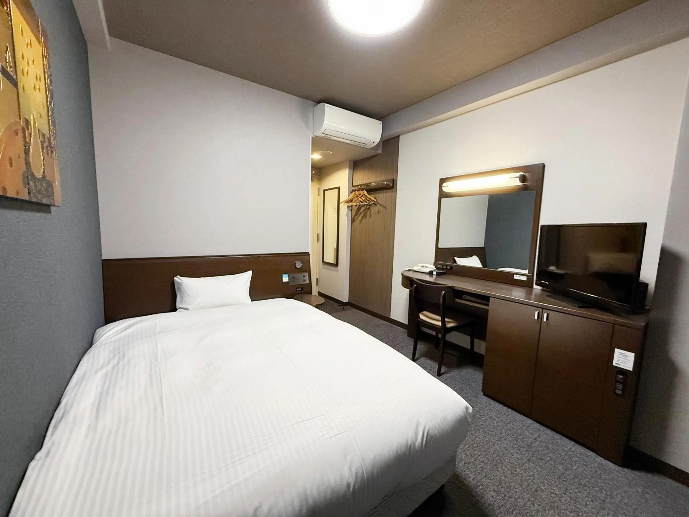 Photo of the whole room, Bed in Hotel Route-Inn Omagari Ekimae