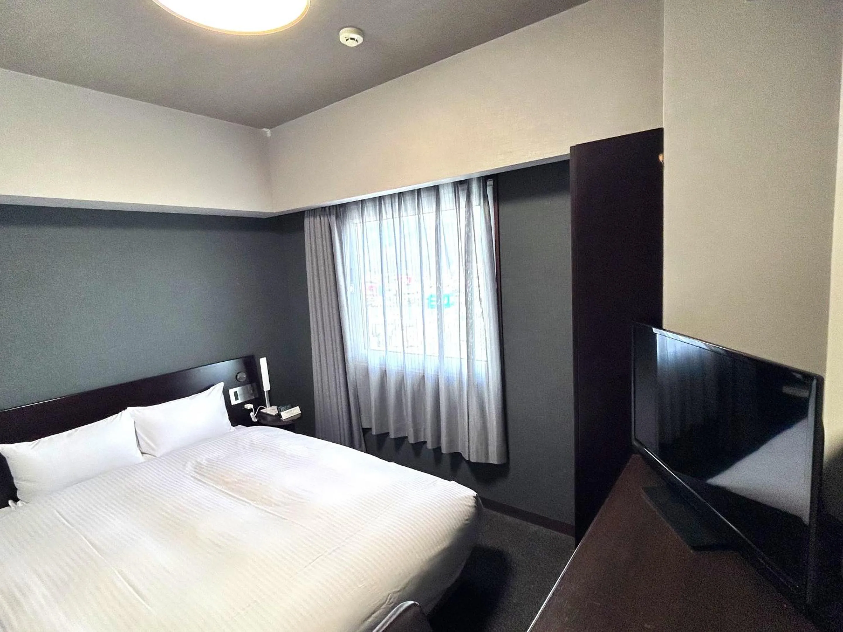 Photo of the whole room, Bed in Hotel Route-Inn Morioka Minami Inter