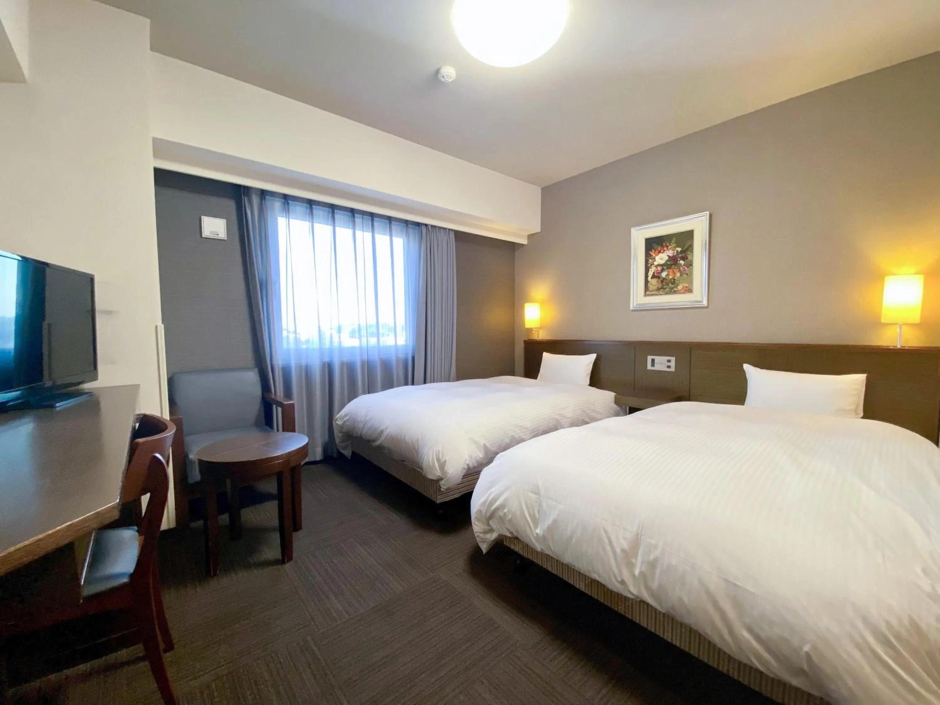 Photo of the whole room, Bed in Hotel Route-Inn Ashikaga Ekimae