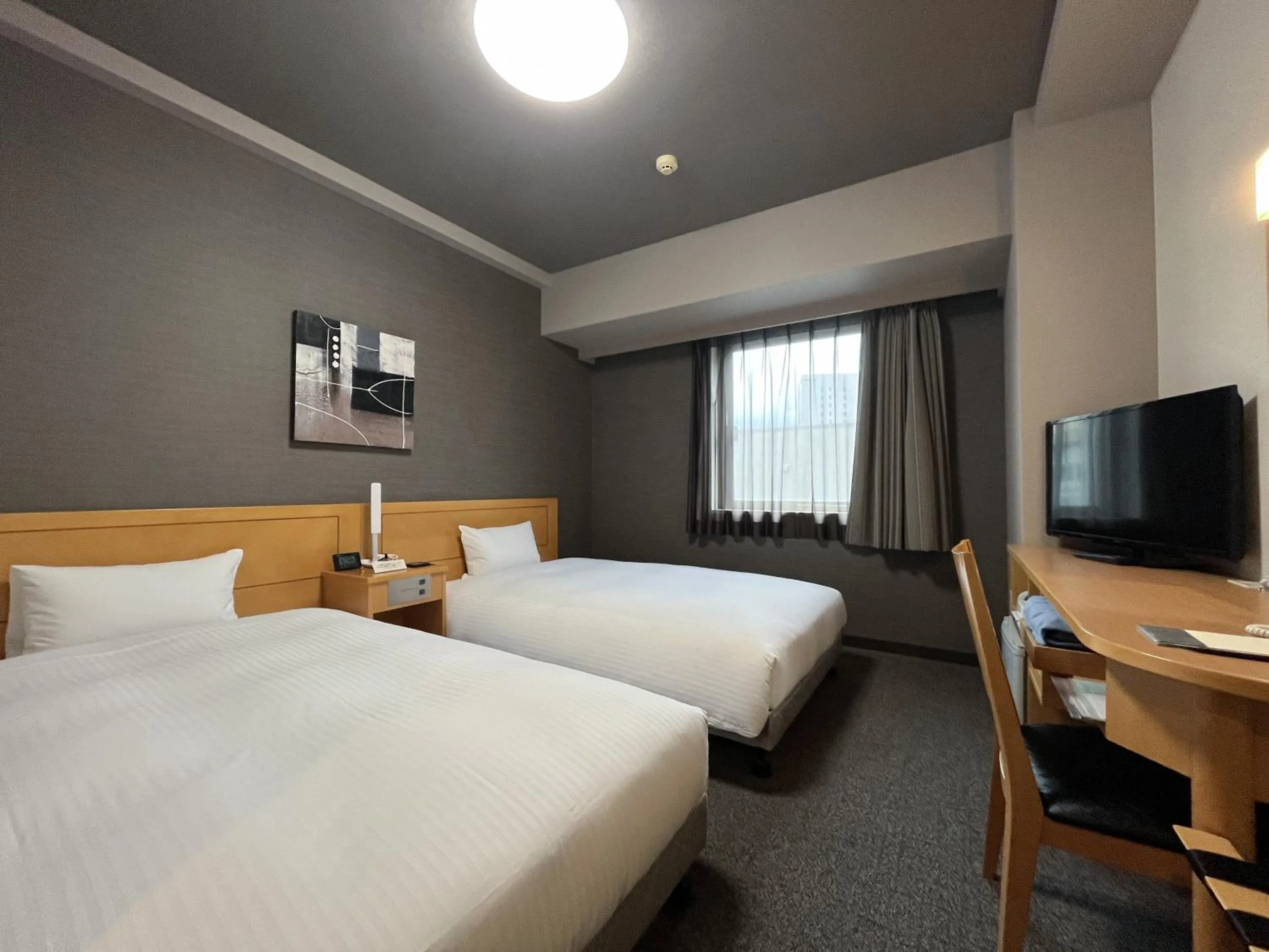Photo of the whole room, Bed in Hotel Route-Inn Morioka Ekimae