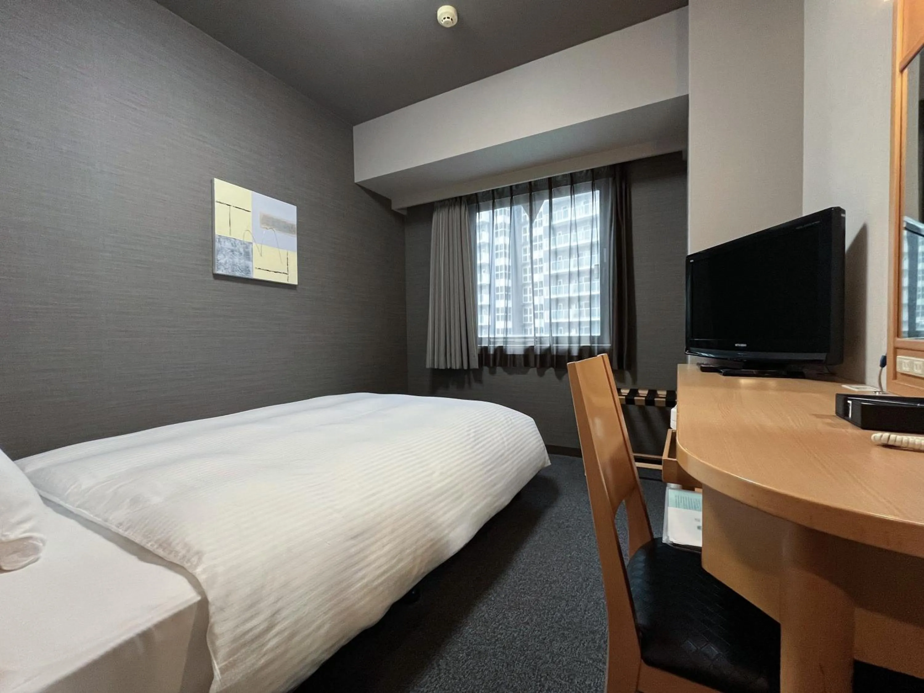 Photo of the whole room, Bed in Hotel Route-Inn Morioka Ekimae