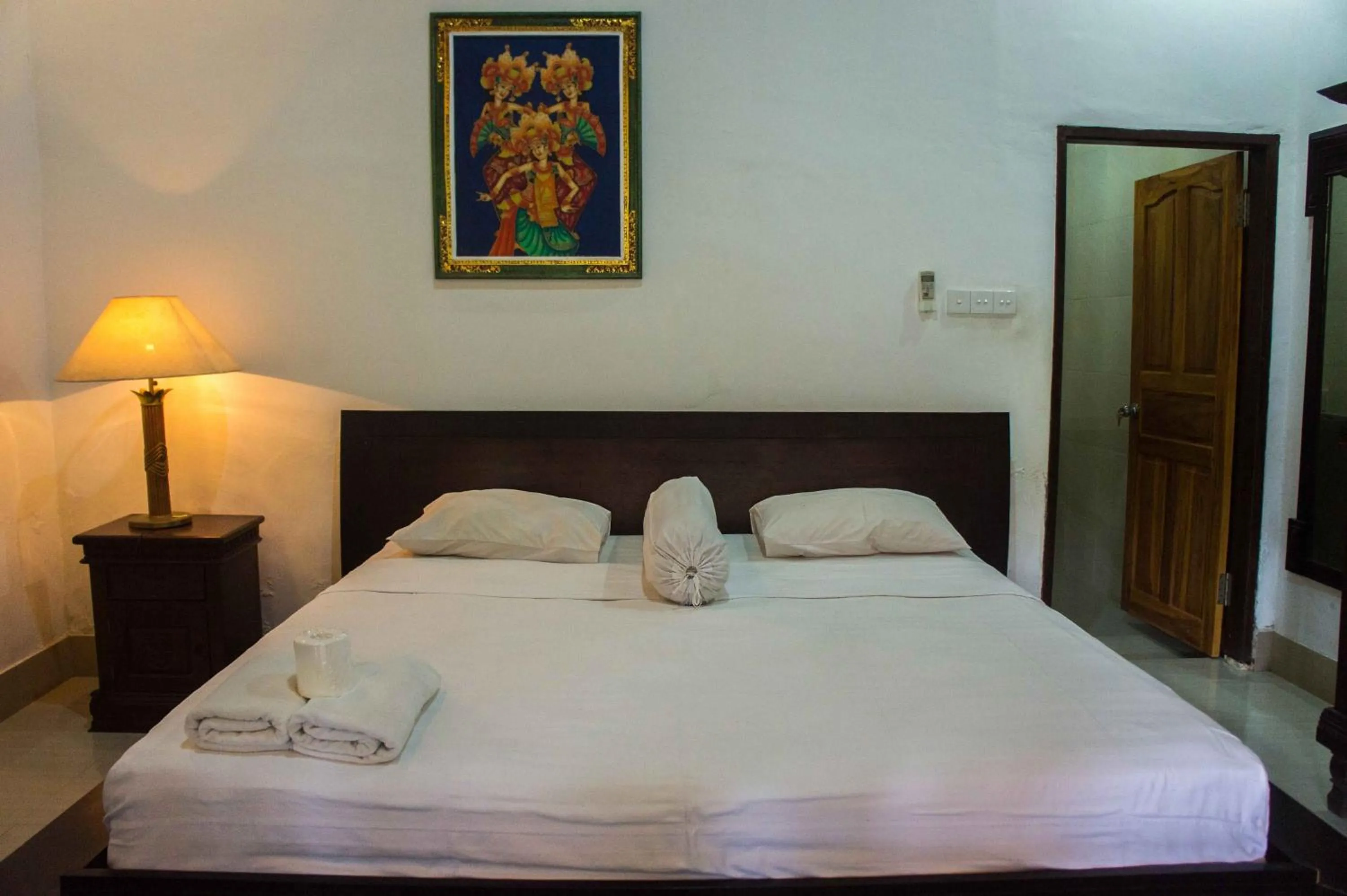 Bed in Putu Guest House