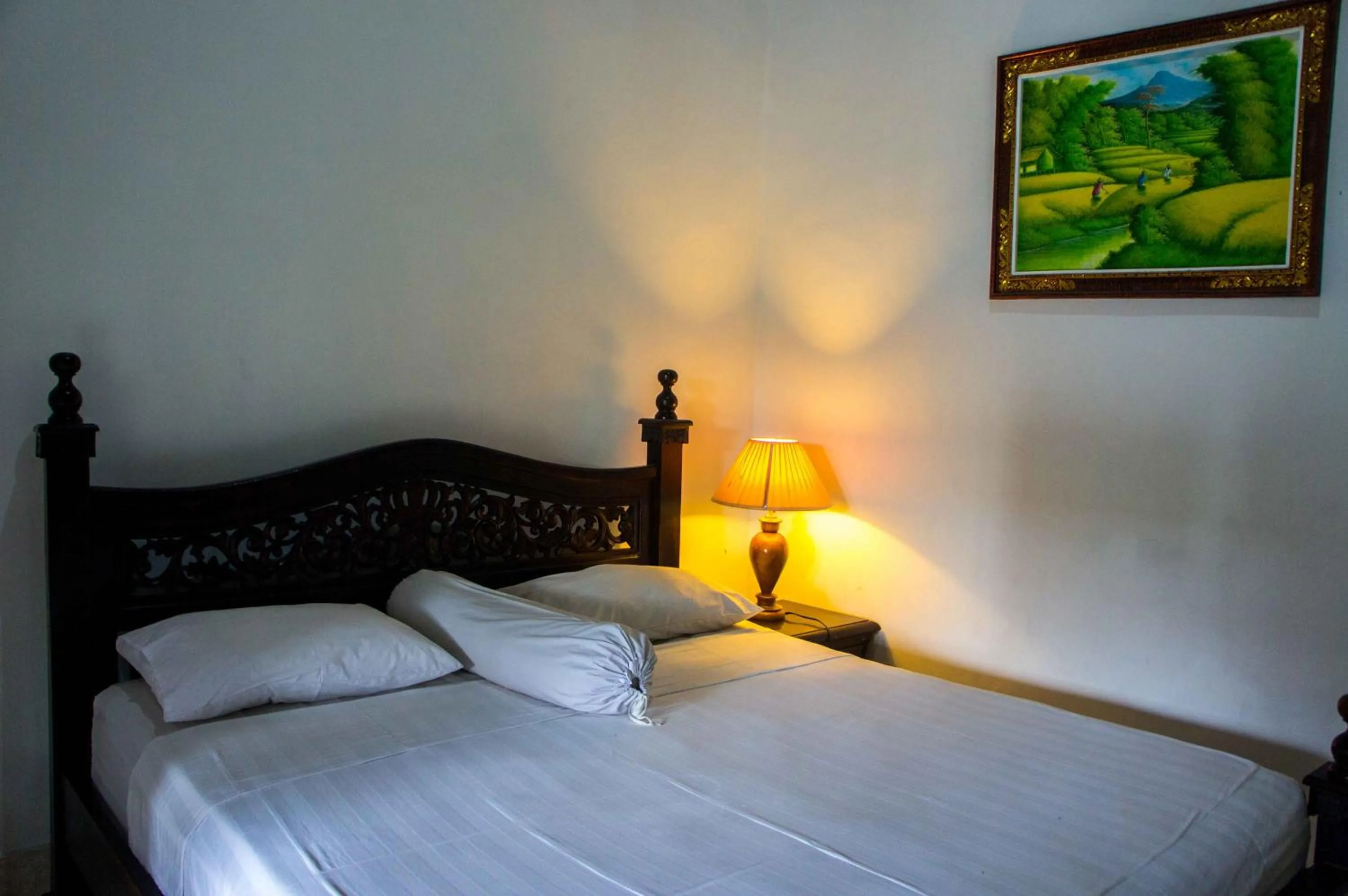 Bed in Putu Guest House