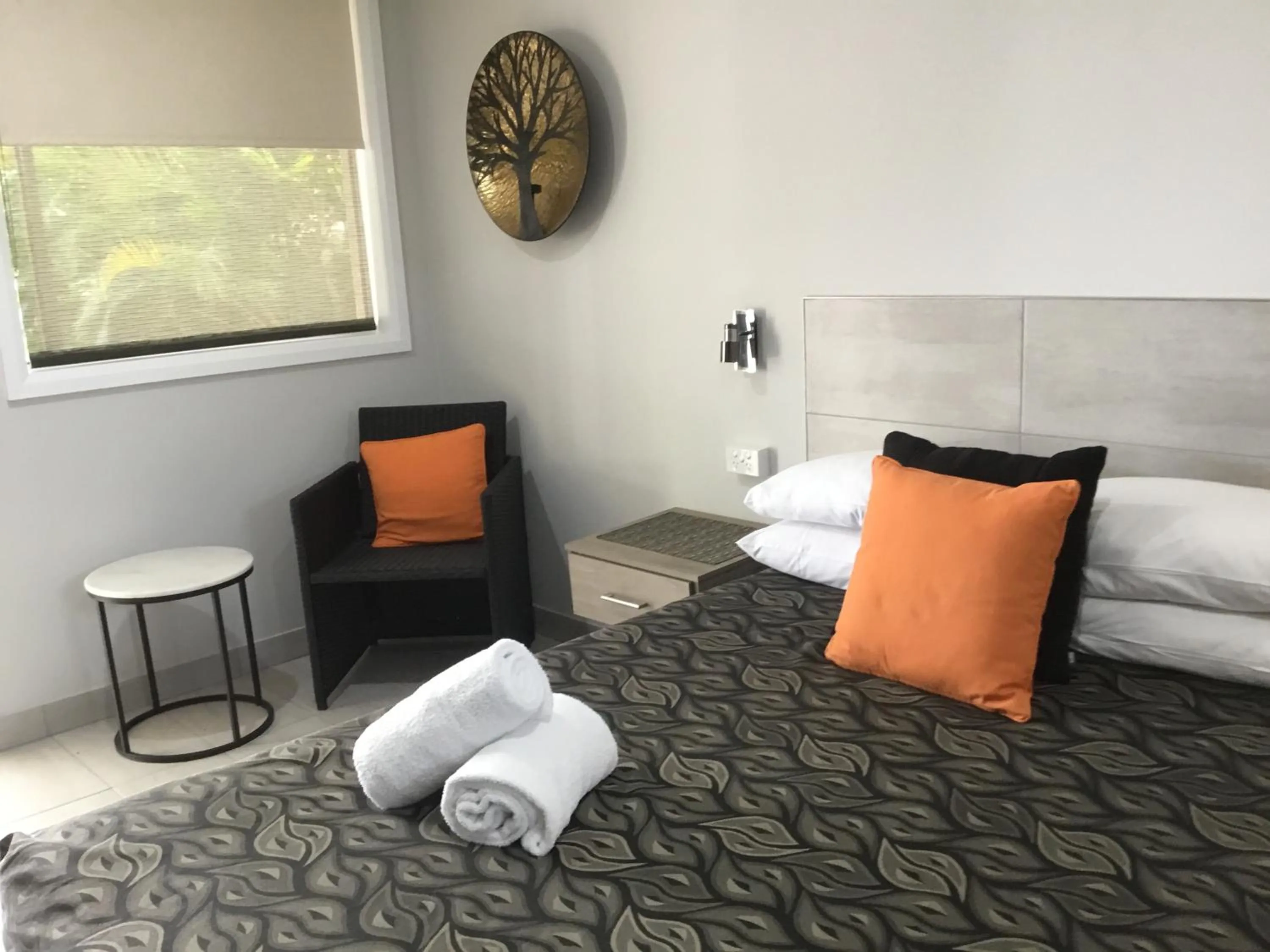 Bed in Golden Palms Motor Inn