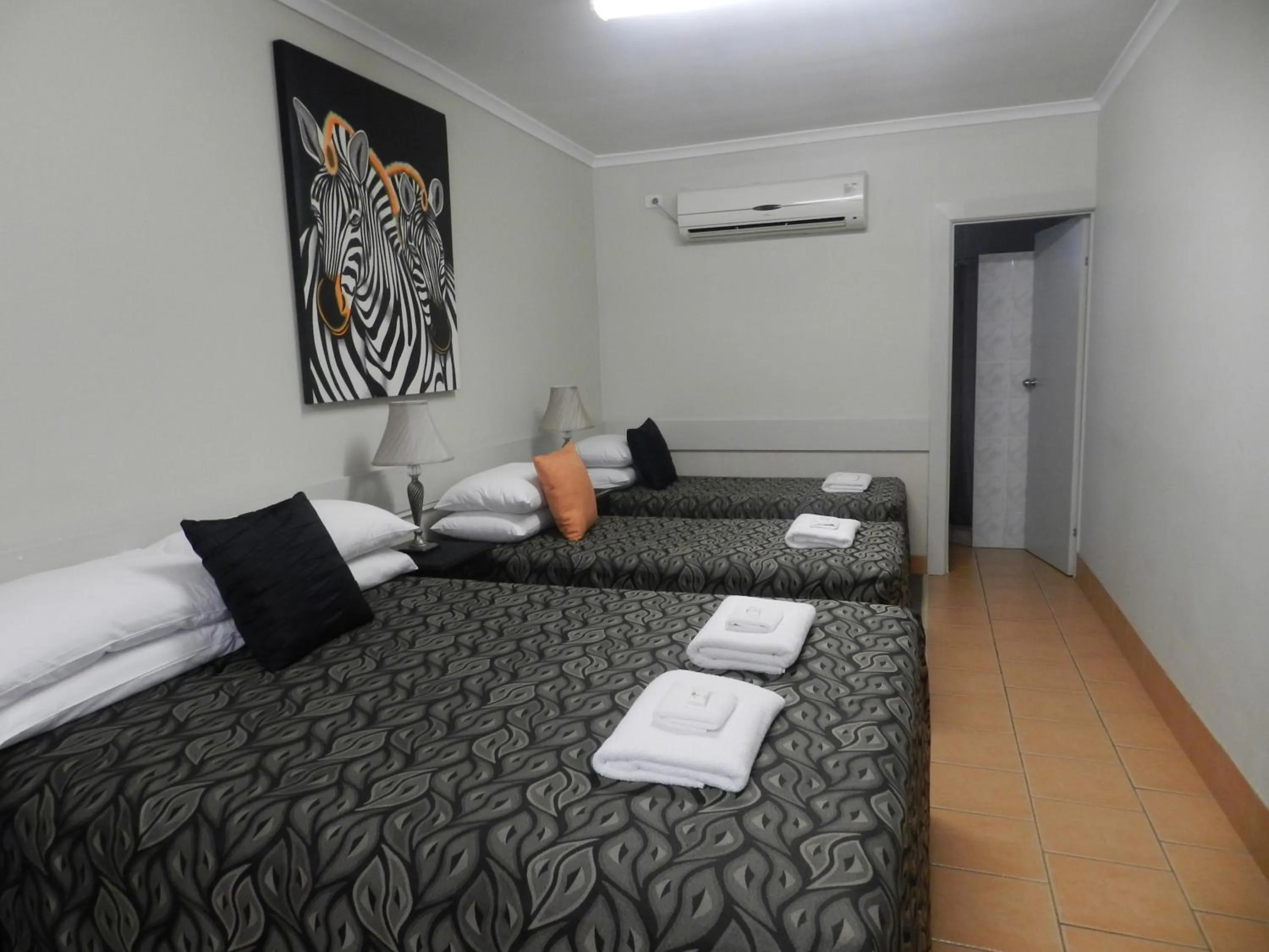 Photo of the whole room, Bed in Golden Palms Motor Inn