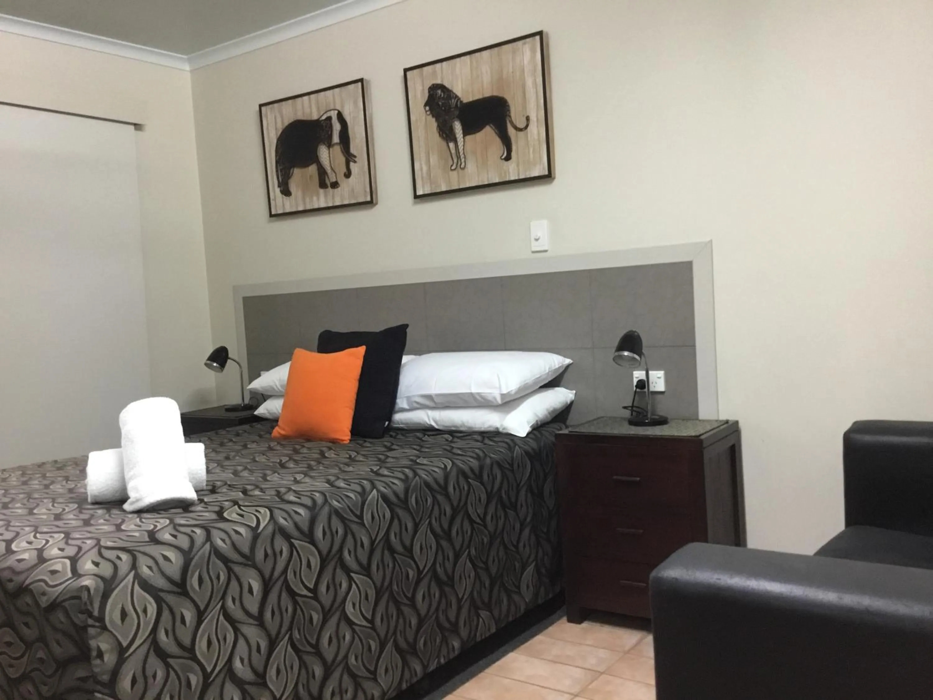 Bed in Golden Palms Motor Inn