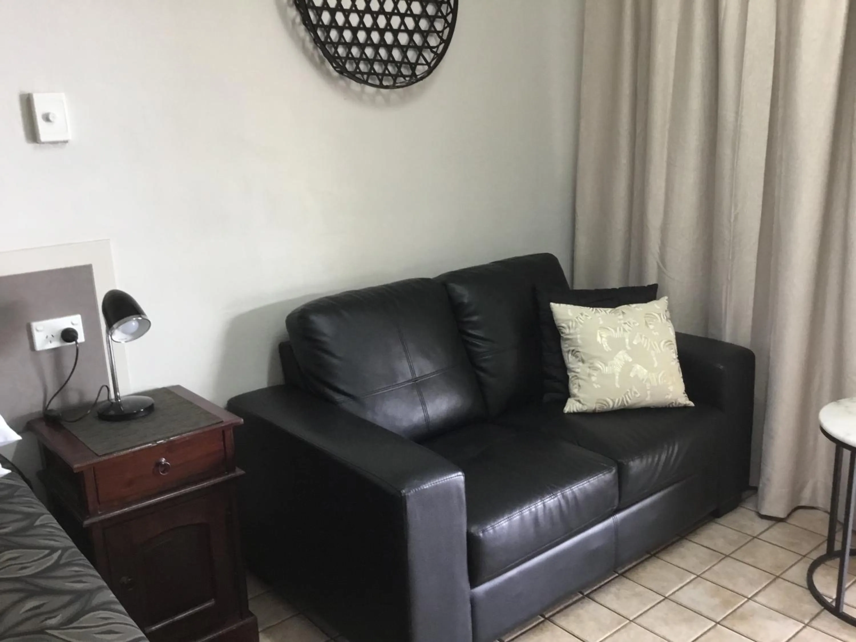 Seating area in Golden Palms Motor Inn