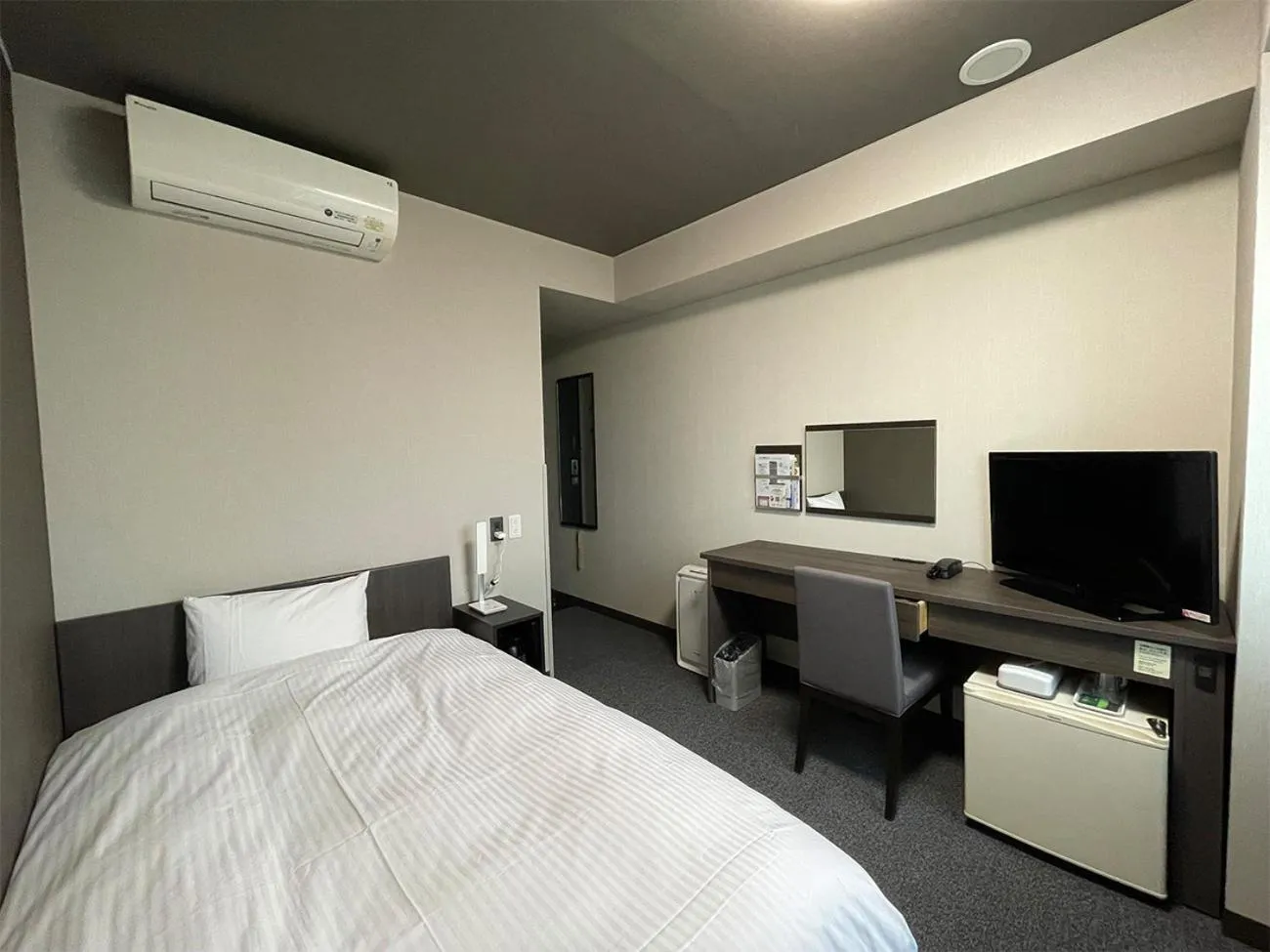 Photo of the whole room, Bed in Hotel Route-Inn Saku Minami Inter