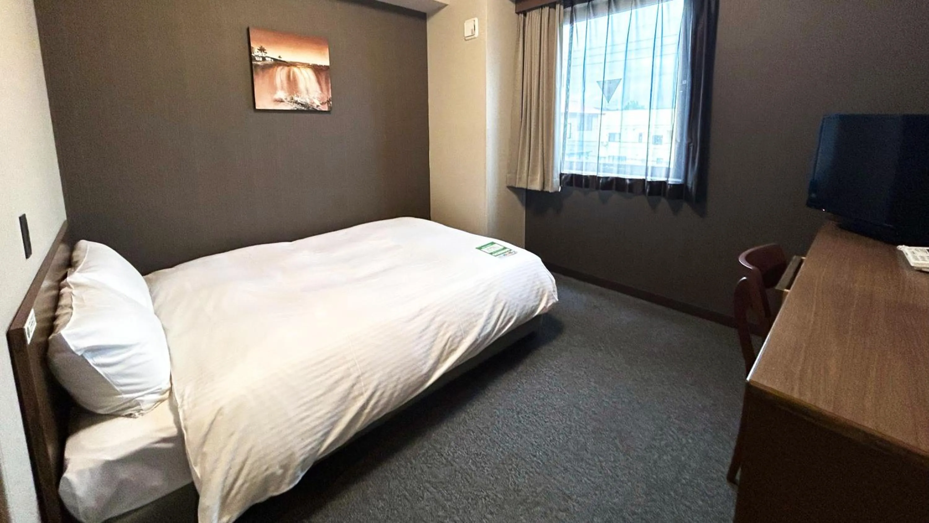 Bed in Hotel Route-Inn Myoko Arai