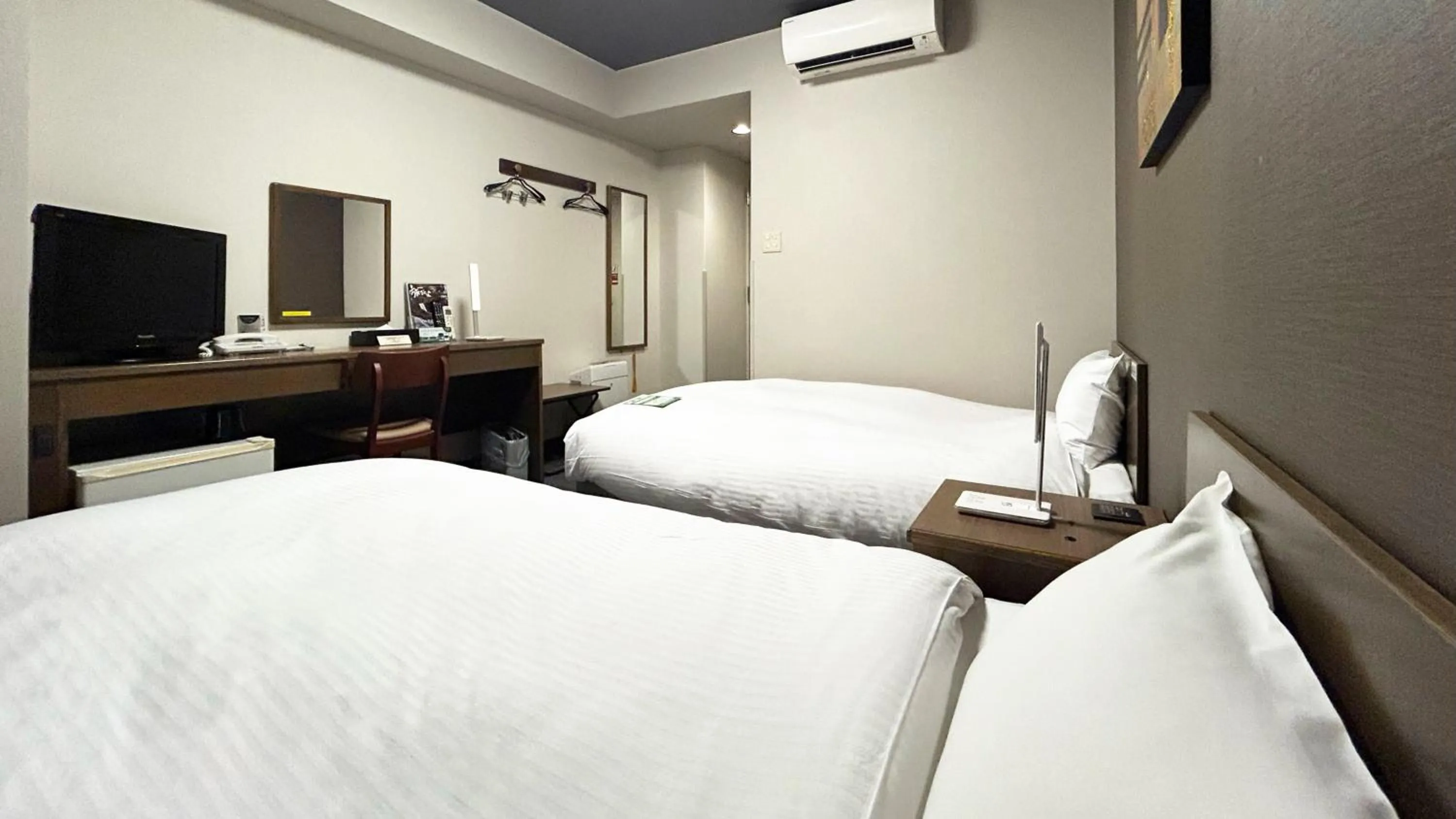 Photo of the whole room, Bed in Hotel Route-Inn Myoko Arai