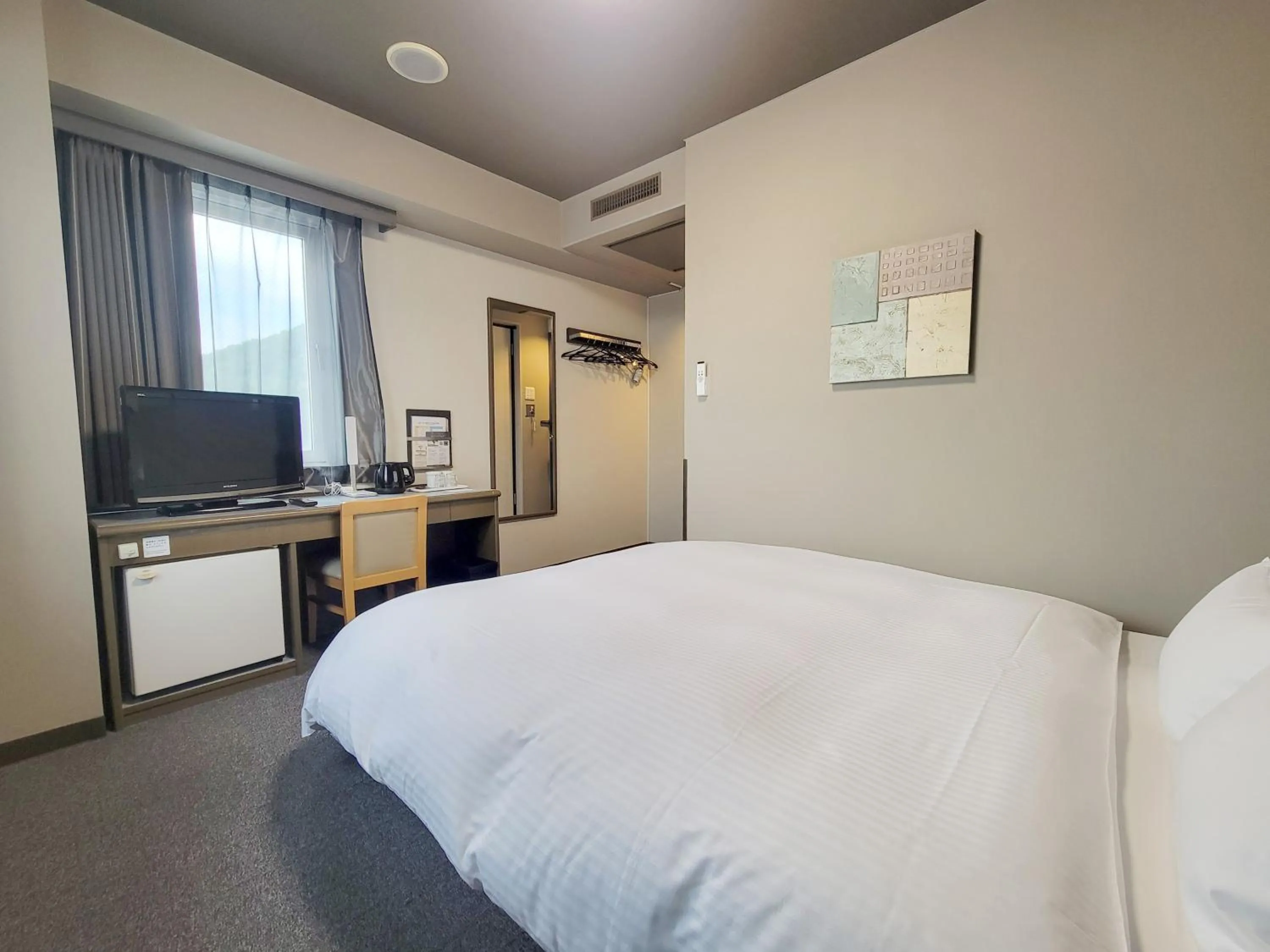 Photo of the whole room, Bed in Hotel Route-Inn Court Chikuma-Koshoku