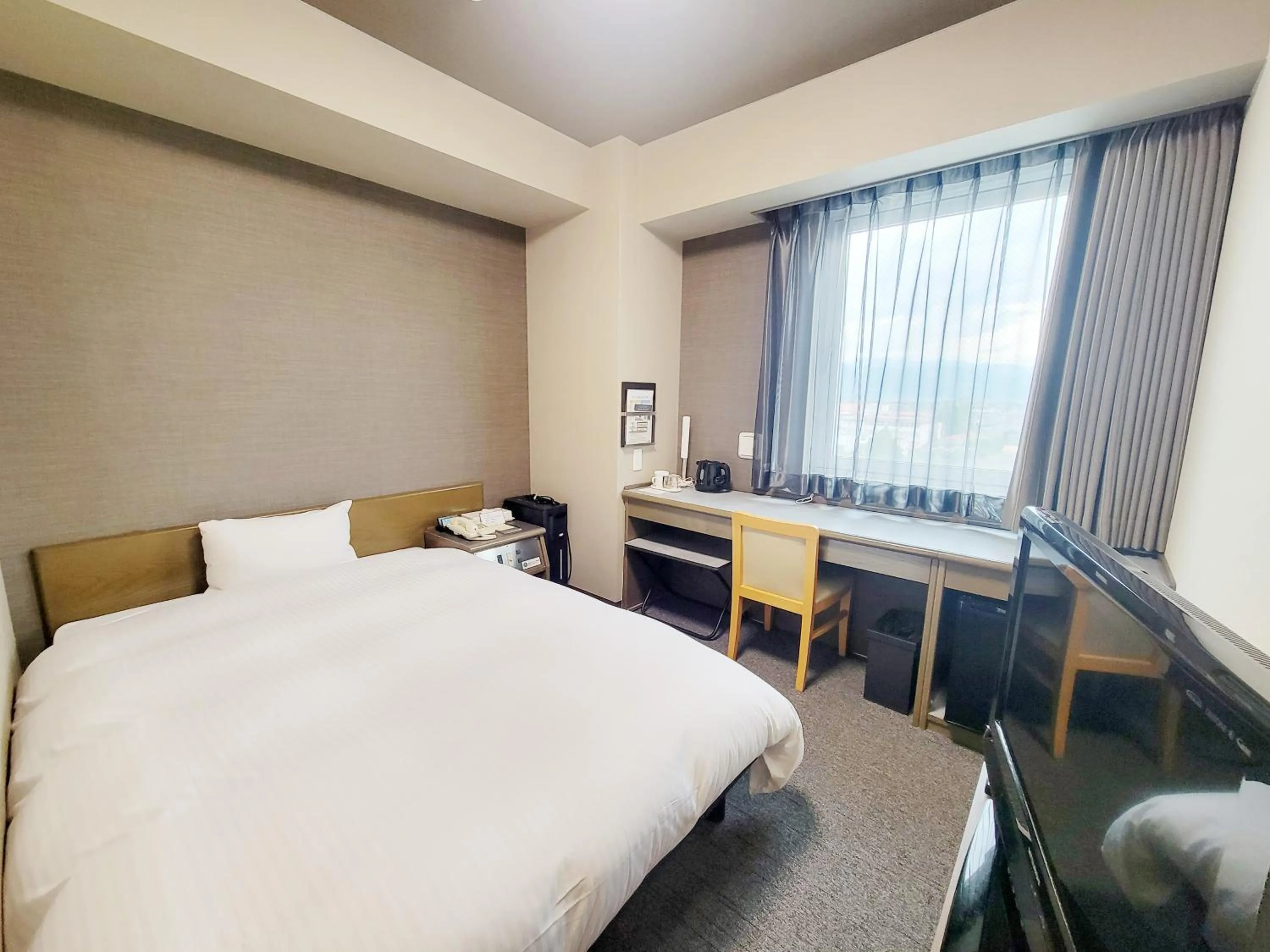 Photo of the whole room, Bed in Hotel Route-Inn Court Chikuma-Koshoku