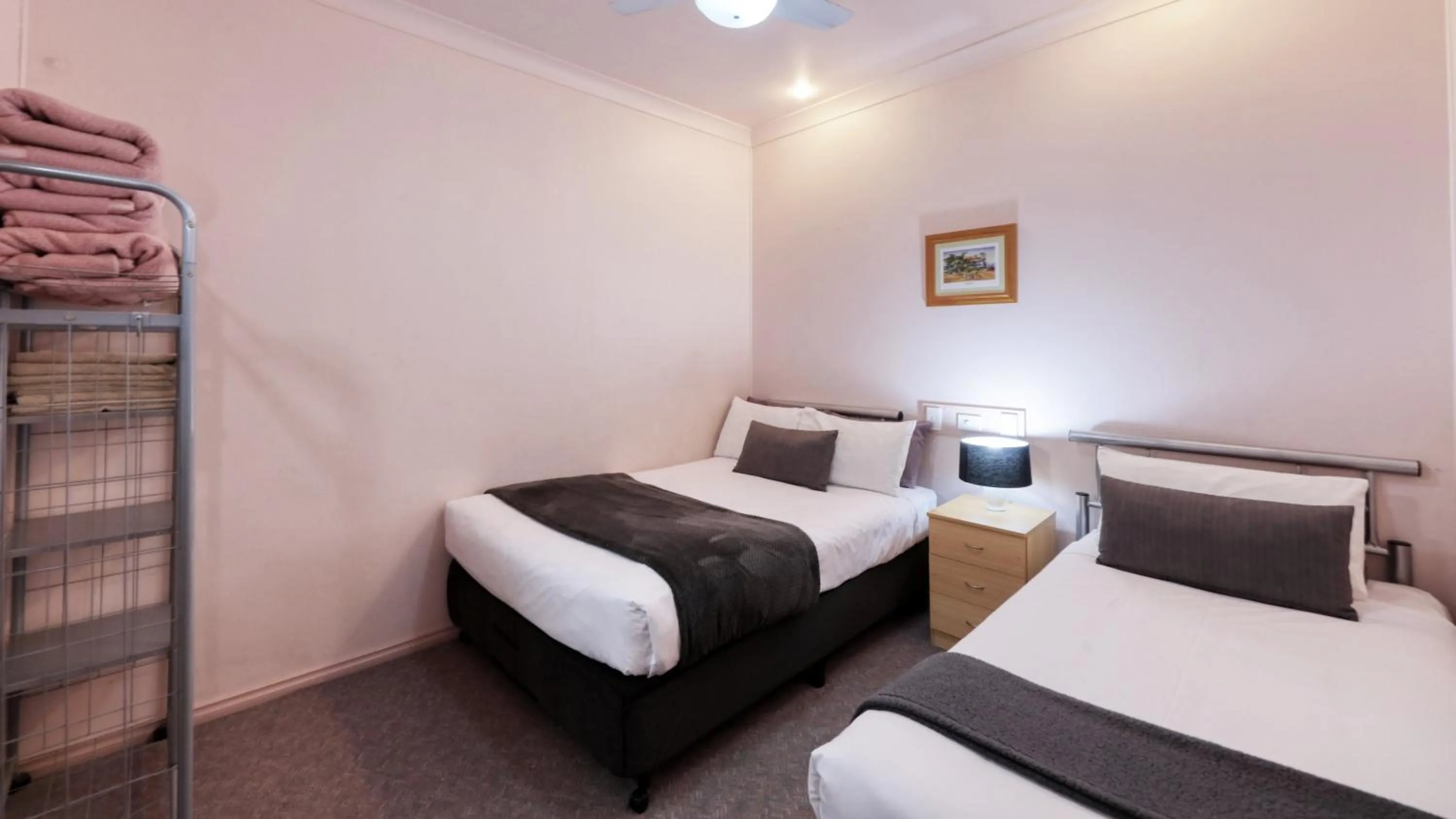 Bed in Tumut Farrington motel