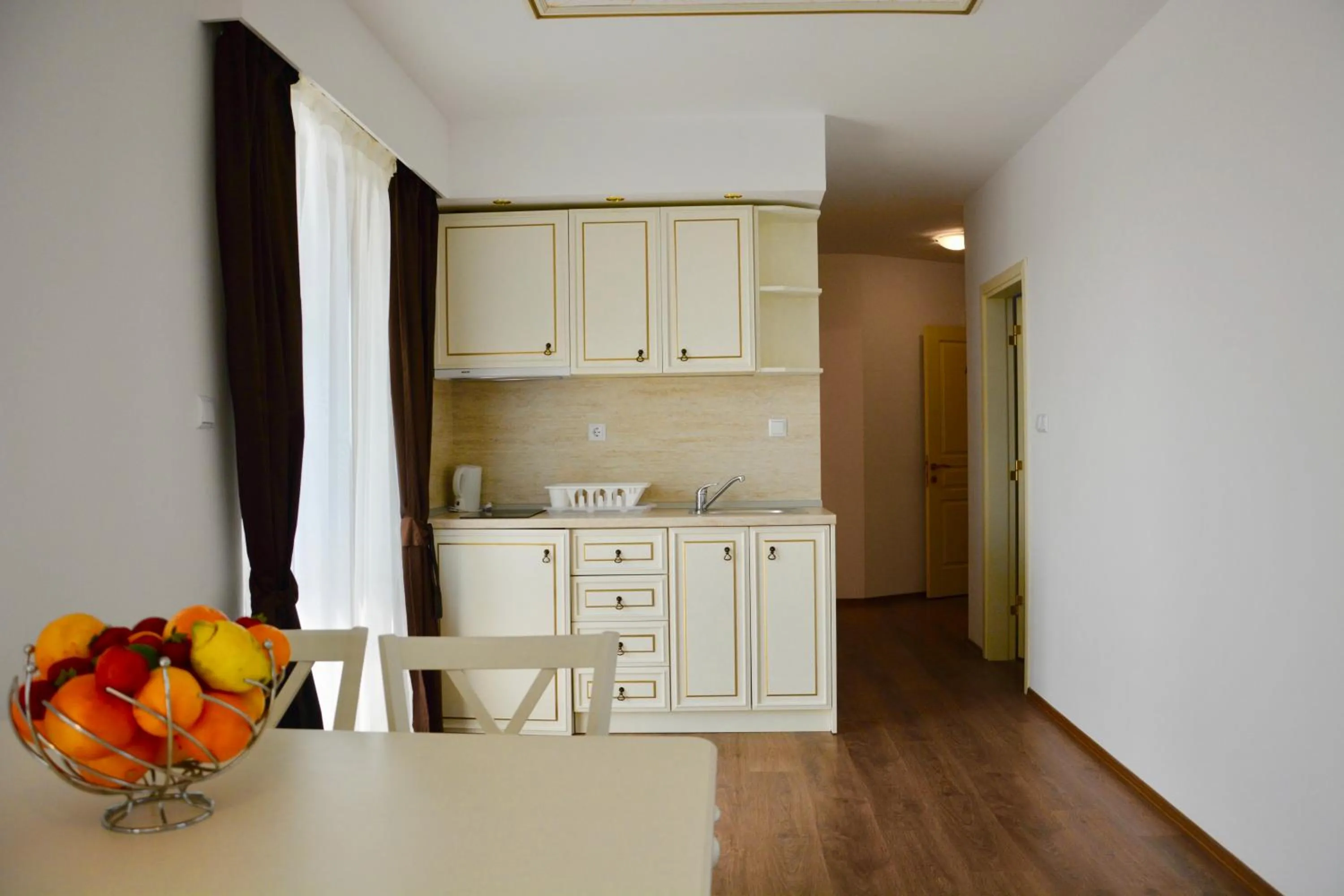 Kitchen or kitchenette in Golden Rainbow Beach Hotel