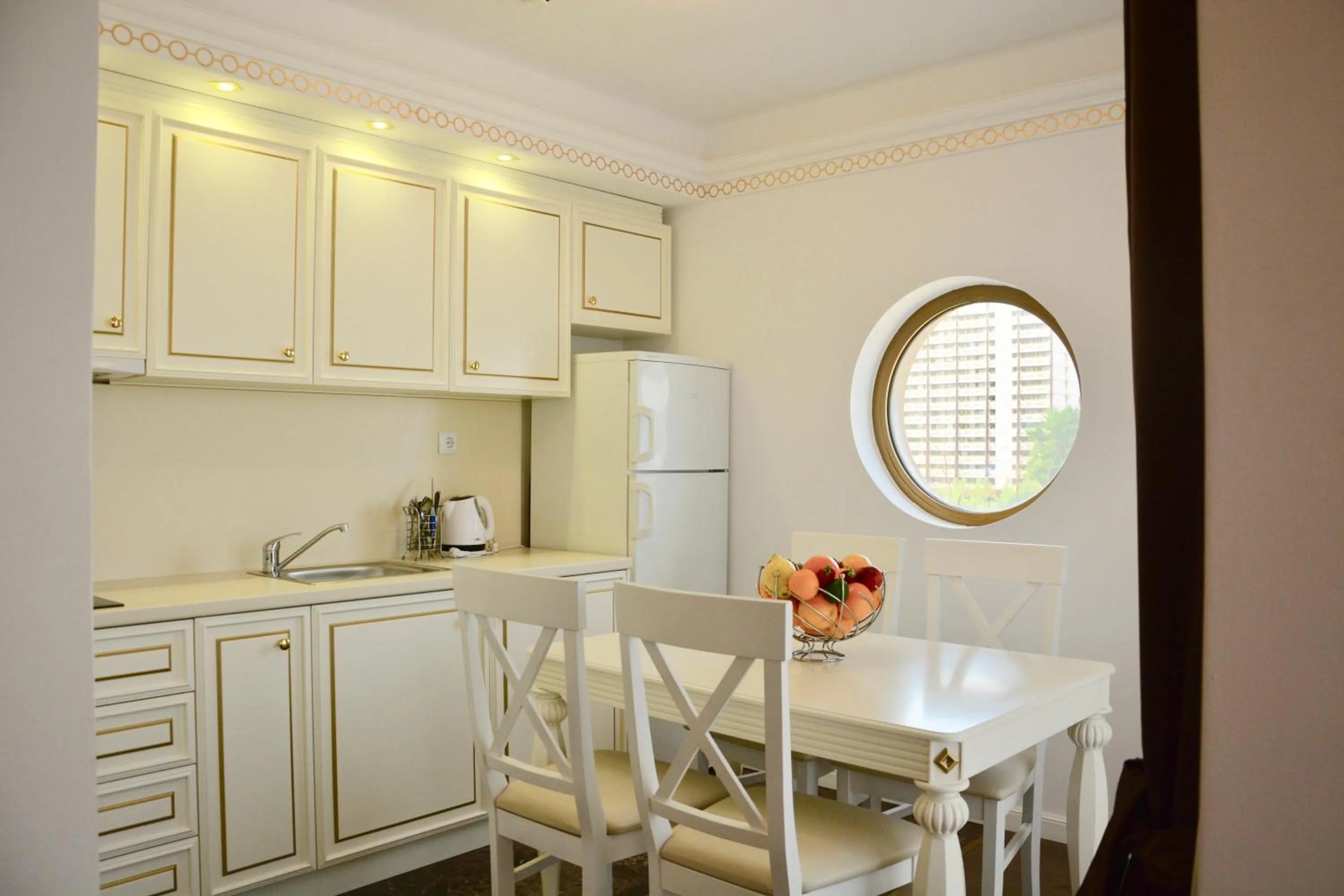 Kitchen or kitchenette in Golden Rainbow Beach Hotel