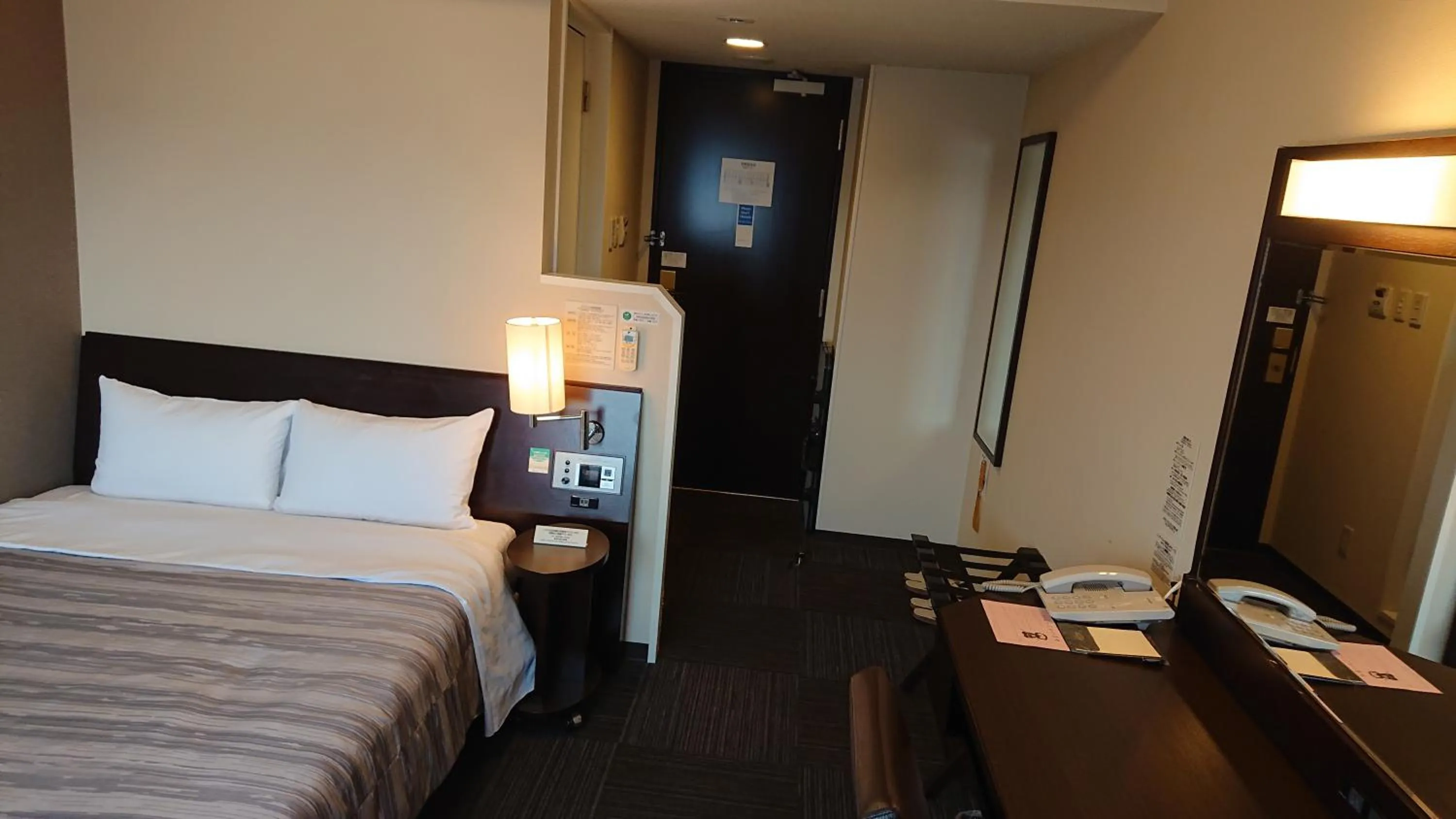 Bed in Route Inn Grantia Wakuranoyado Igauenojomae