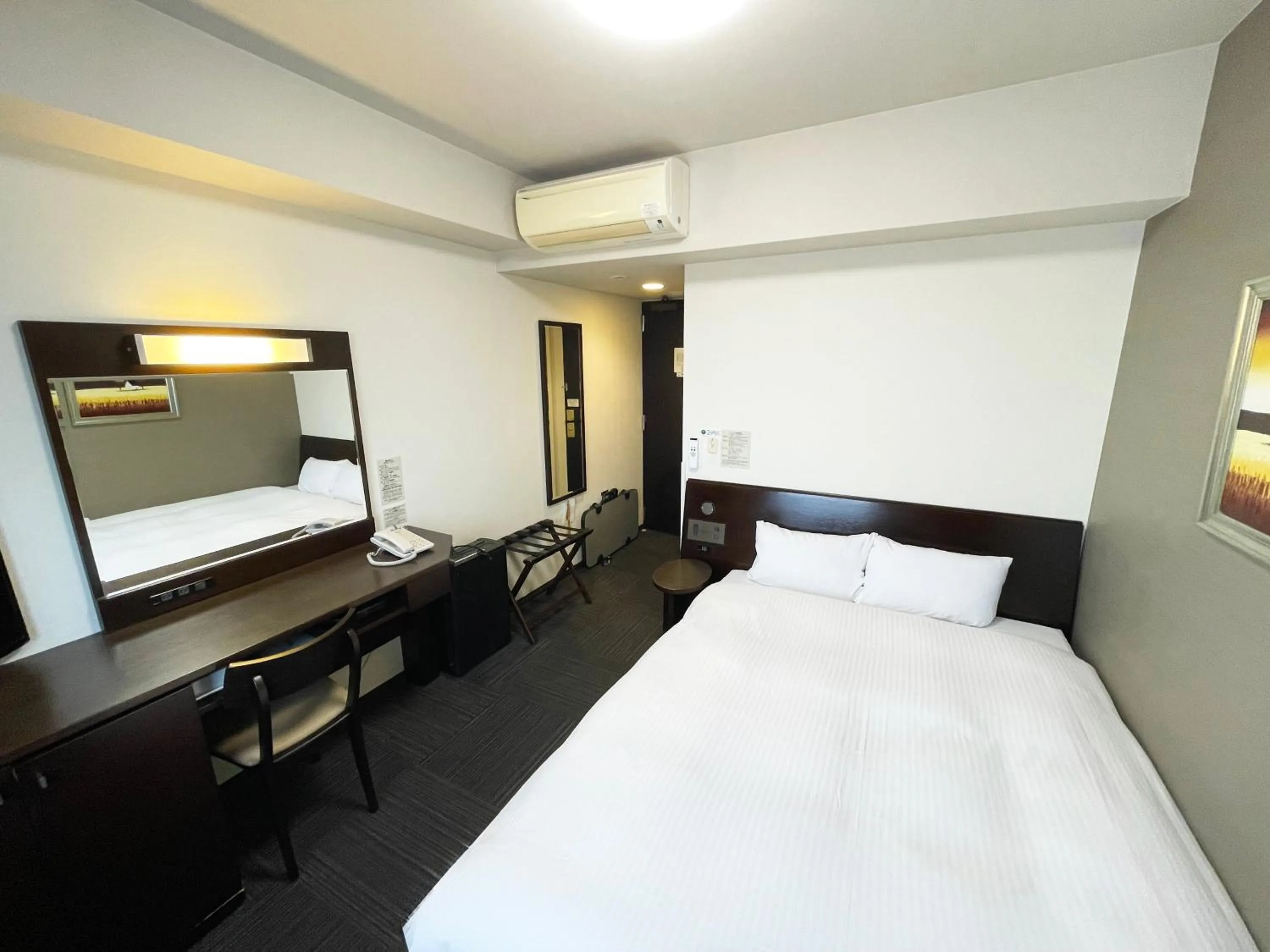 Photo of the whole room, Bed in Route Inn Grantia Himi Wakuranoyado