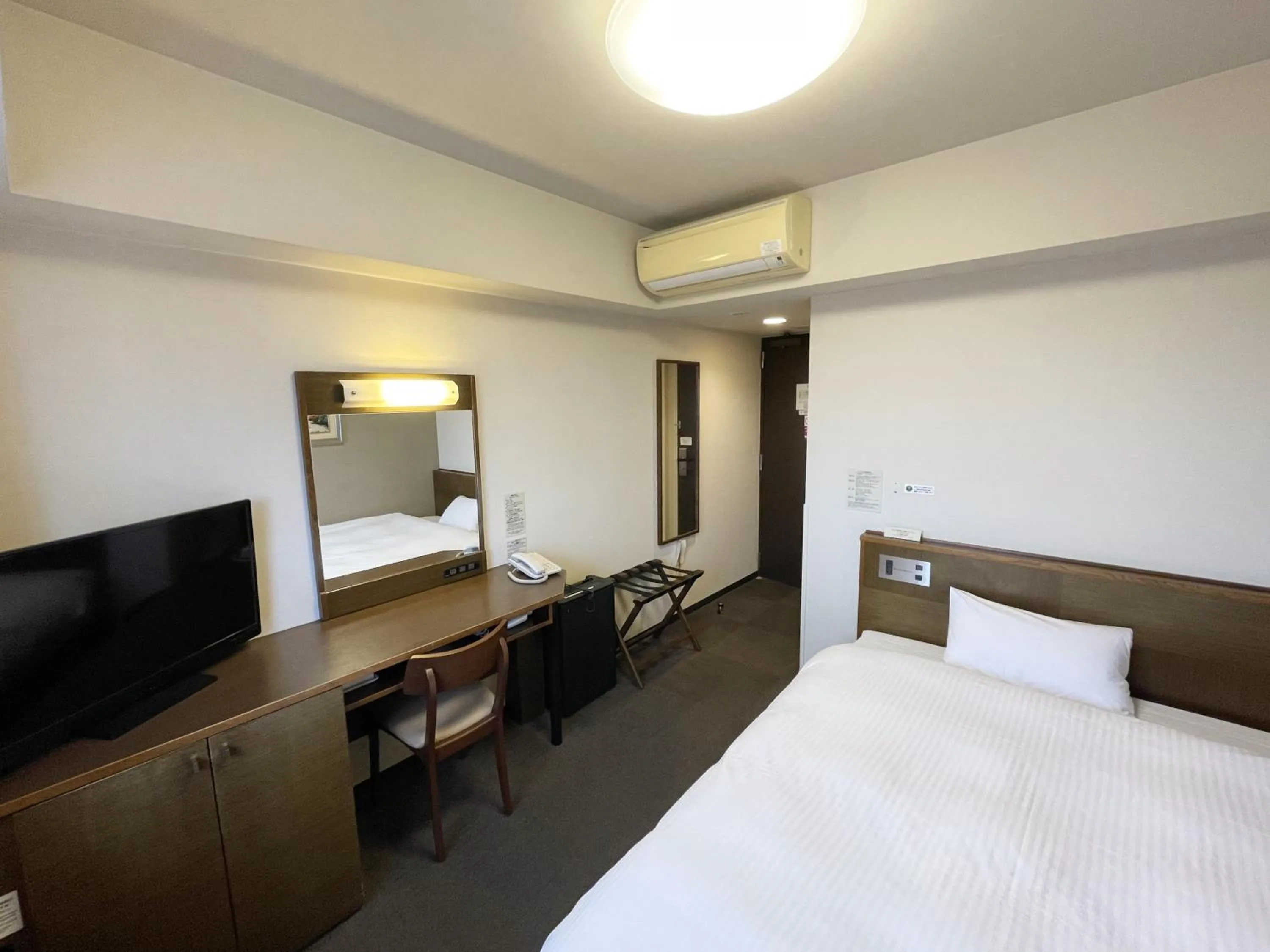 Photo of the whole room, Bed in Route Inn Grantia Himi Wakuranoyado