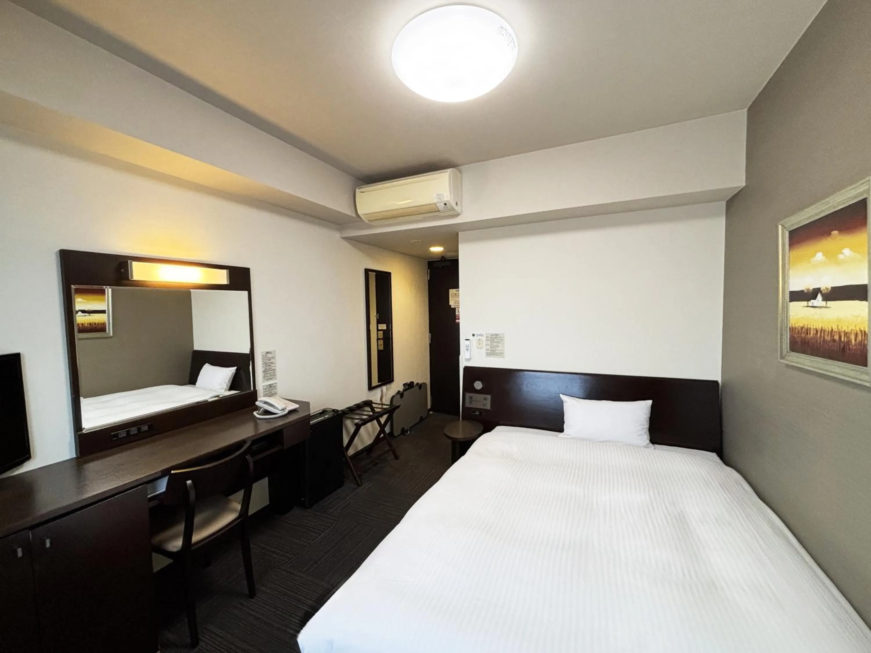 Photo of the whole room, Bed in Route Inn Grantia Himi Wakuranoyado