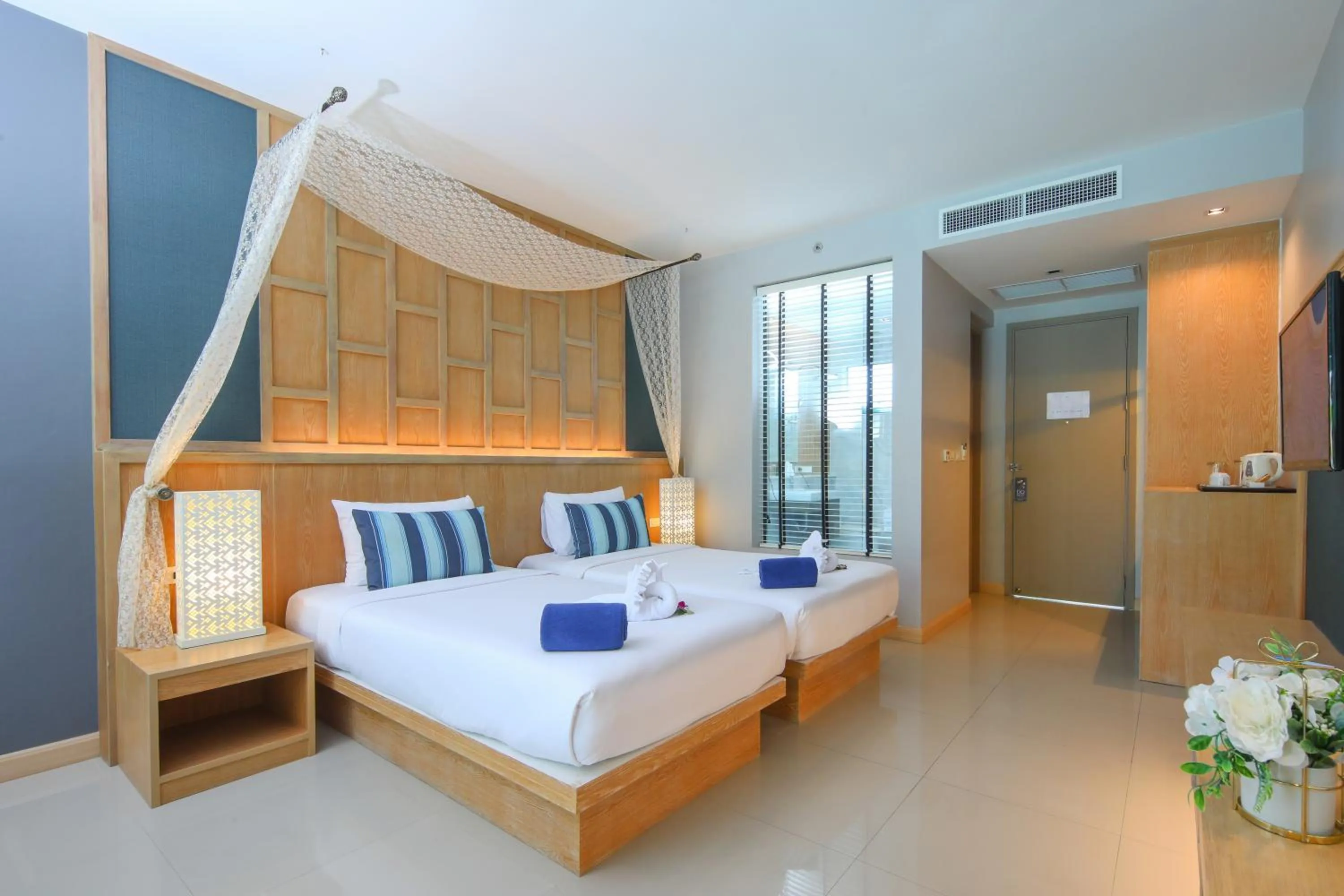 Photo of the whole room, Bed in CRAFT Resort & Villas, Phuket Town