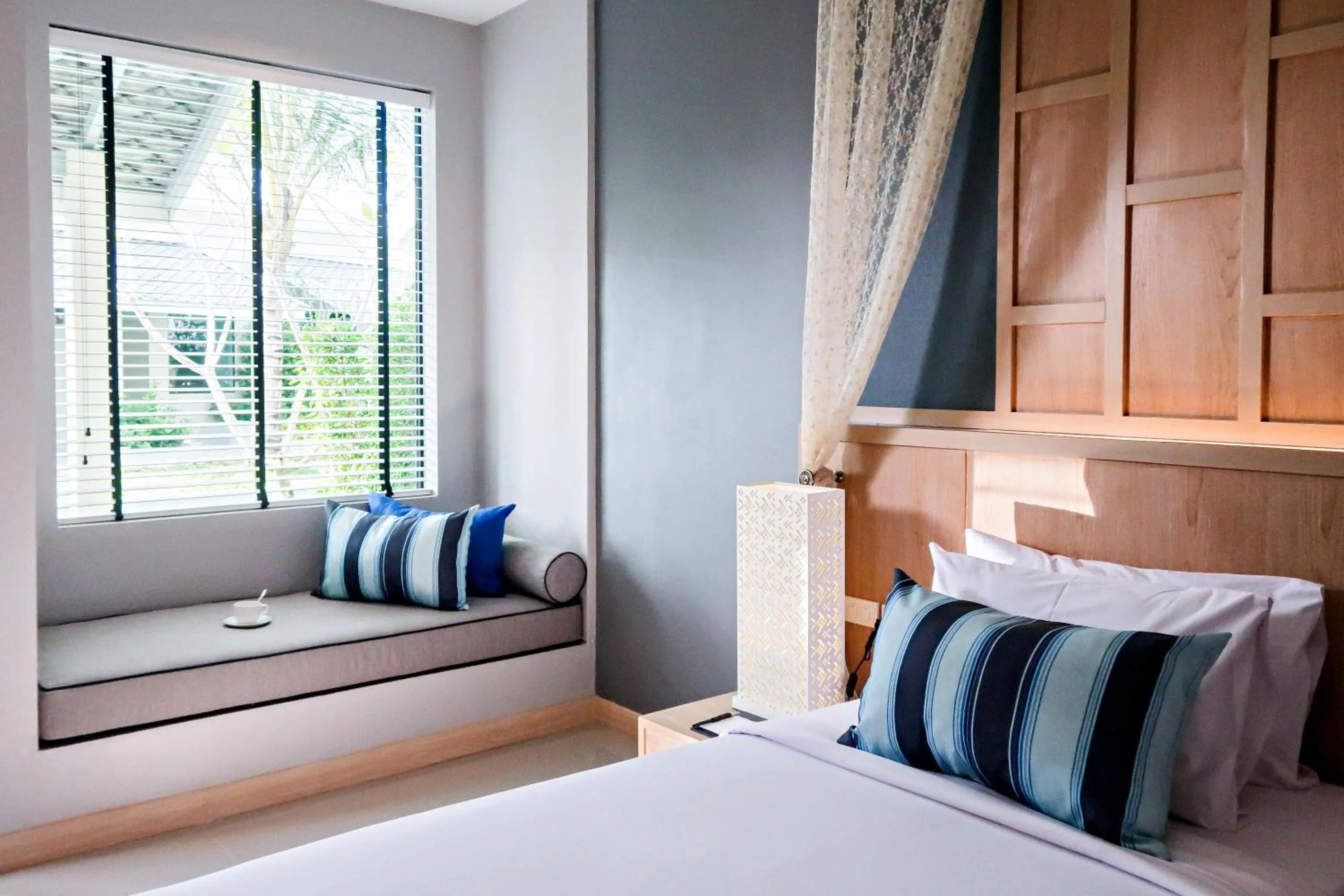 Photo of the whole room, Bed in CRAFT Resort & Villas, Phuket Town