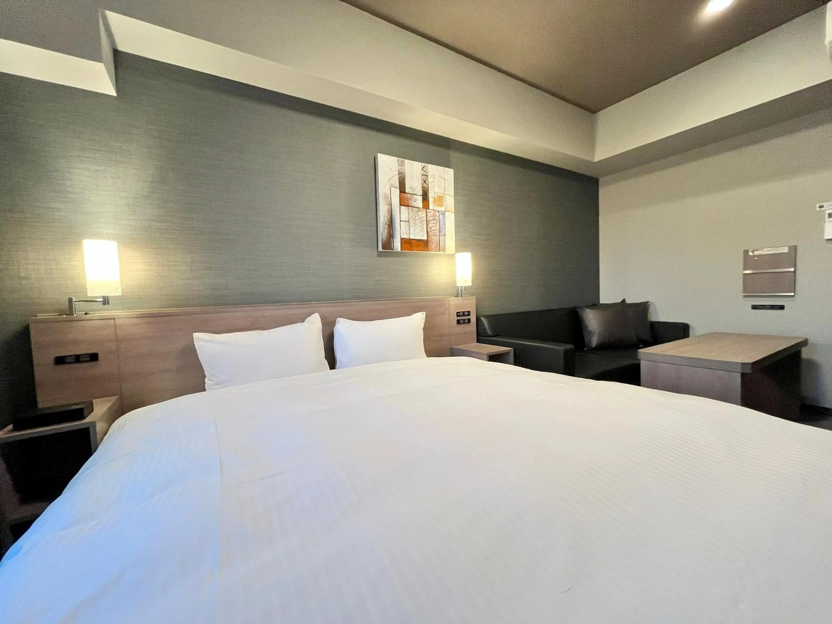 Photo of the whole room, Bed in Hotel Route-Inn Nagaoka Ekimae