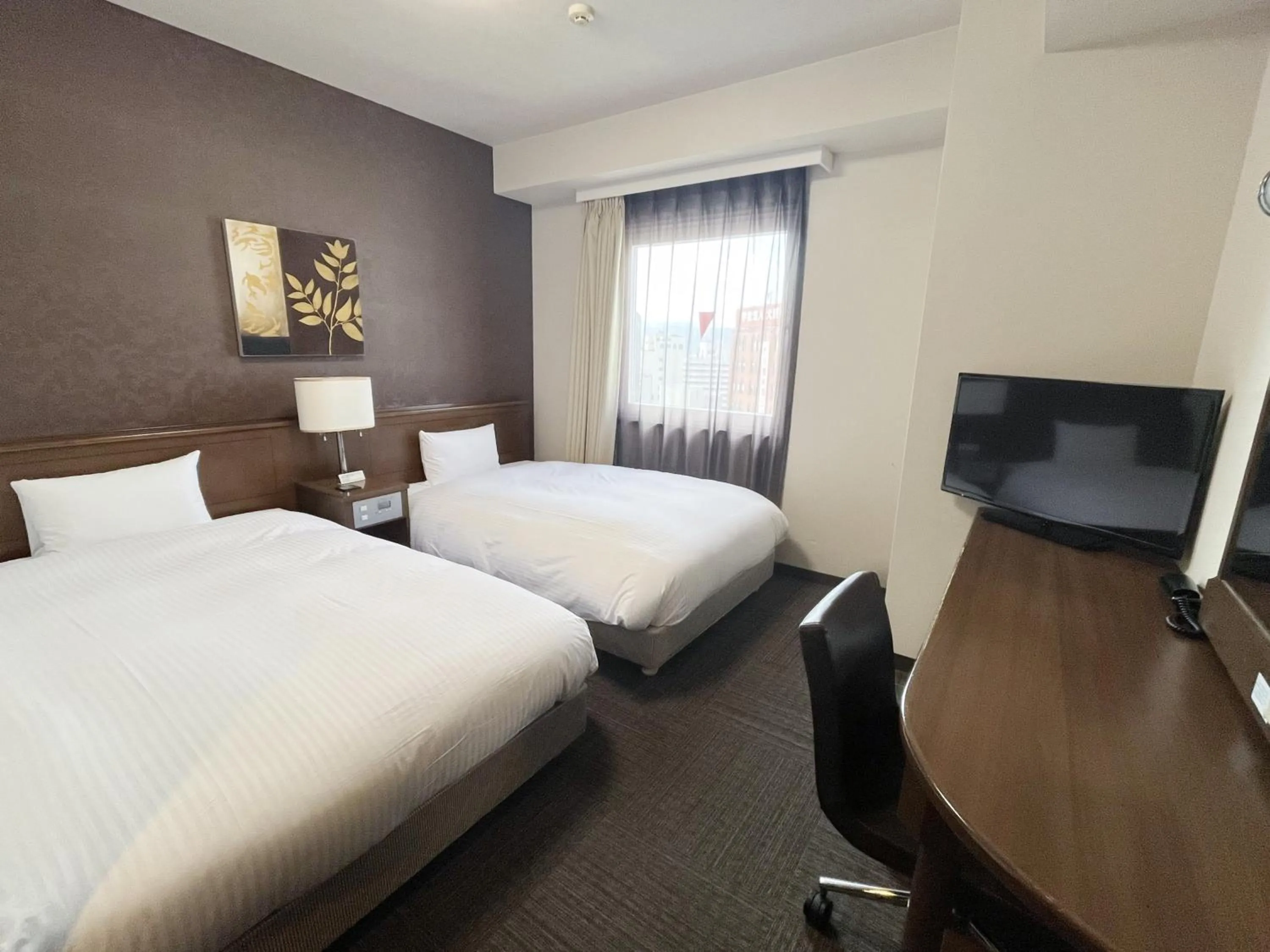 Photo of the whole room, Bed in Hotel Route-Inn Fukui Ekimae