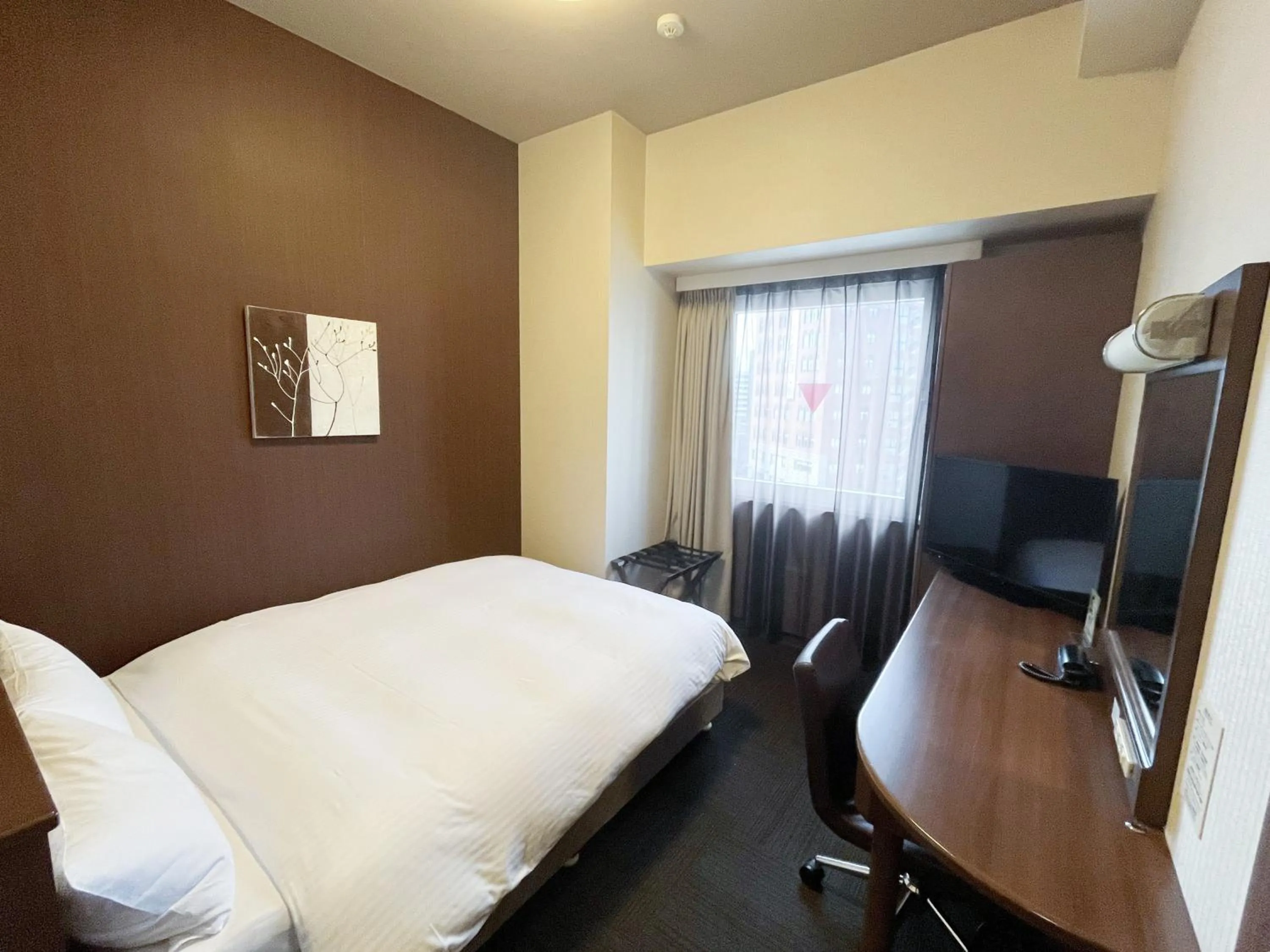 Photo of the whole room, Bed in Hotel Route-Inn Fukui Ekimae