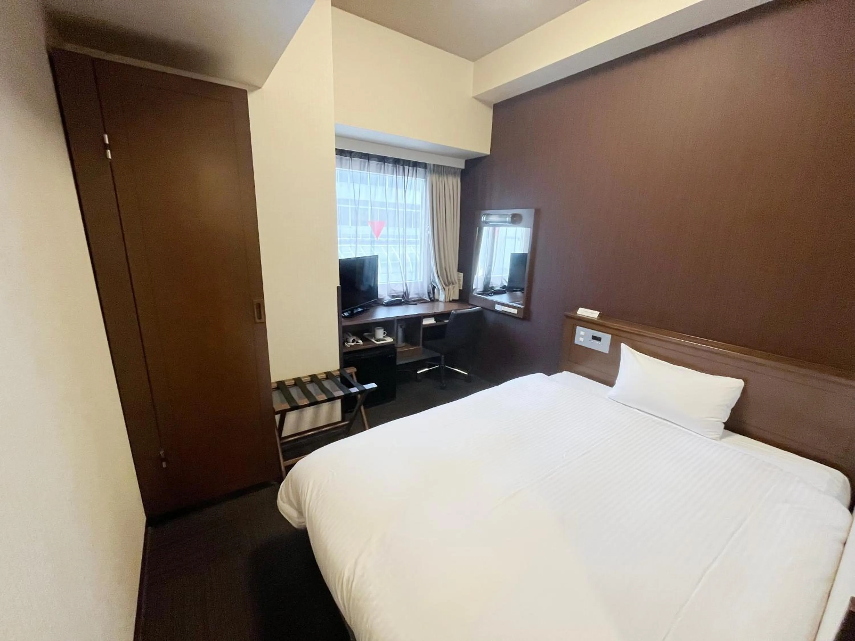 Photo of the whole room, Bed in Hotel Route-Inn Fukui Ekimae