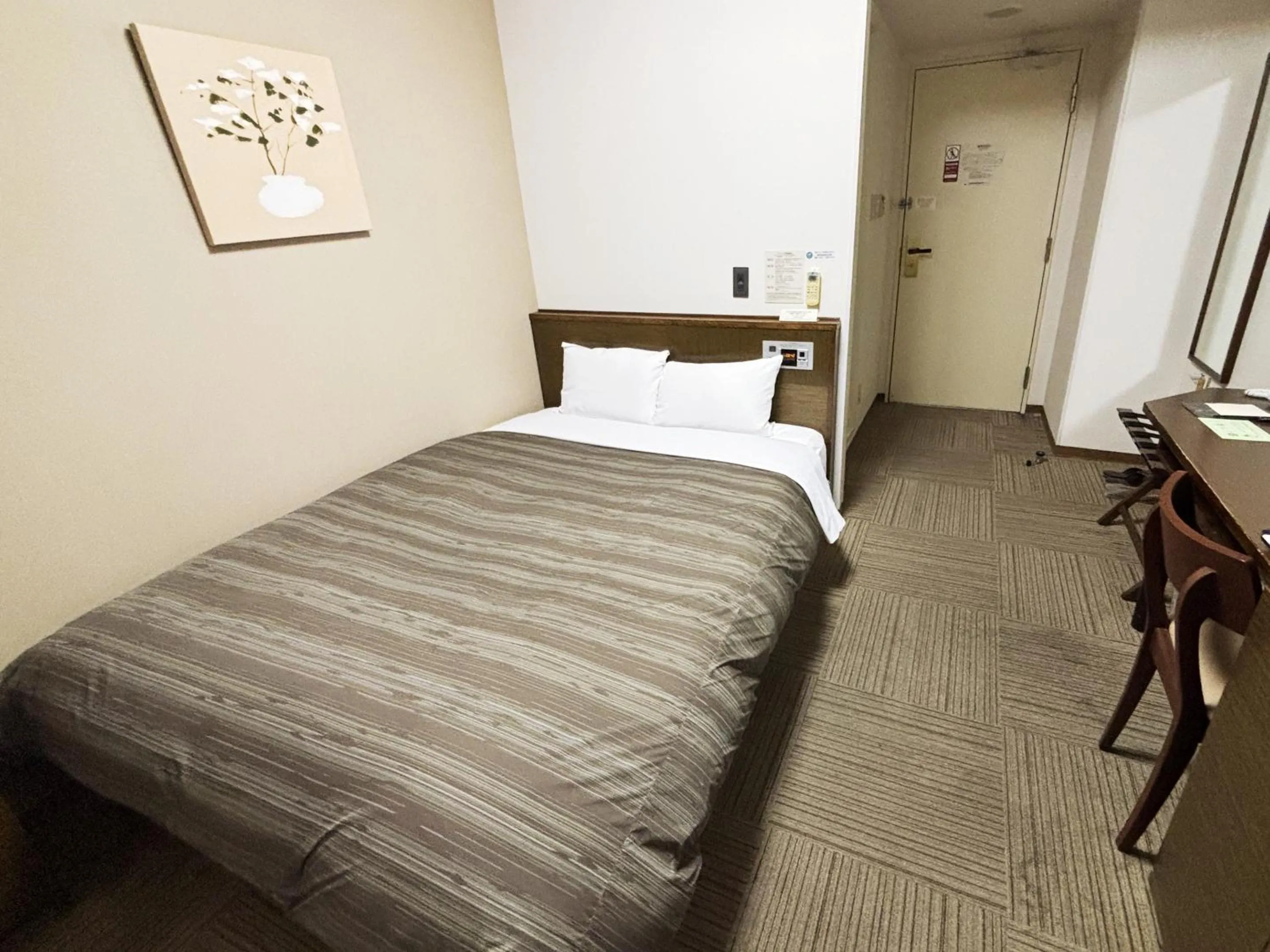 Photo of the whole room, Bed in Hotel Route-Inn Shibukawa